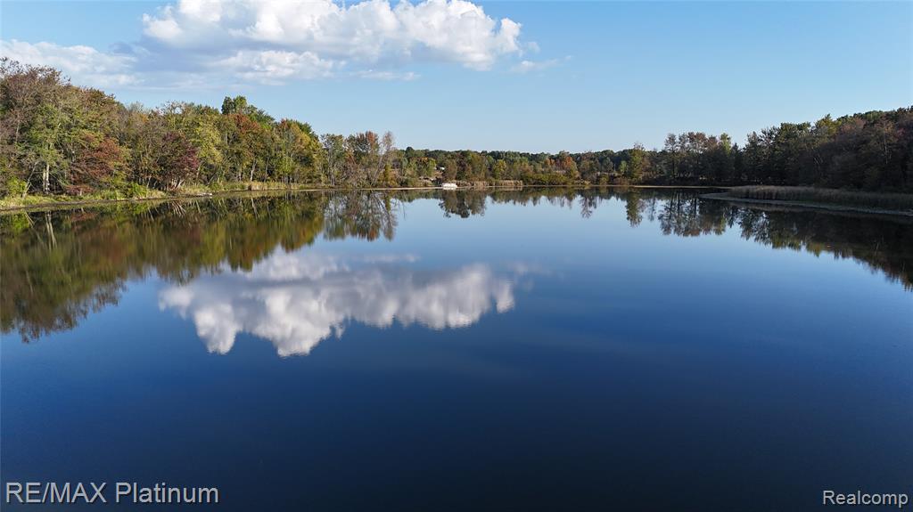 Discover your own 57+-acre oasis — a rare combination of seclusion, natural beauty, and convenience. This incredible property features rolling terrain, tall hardwoods, multiple walkout build sites, and a stunning 12-acre all-sport lake right at the heart of it all. Whether you envision a single dream estate, a sportsman's retreat for hunting & fishing or even explore possible splits, the opportunities are endless.Perfectly situated just 30–45 minutes to Ann Arbor, Jackson, and Lansing, this property offers the ideal balance of privacy and accessibility. Truly a once-in-a-lifetime setting — a place where every sunrise and sunset feels like your own slice of heaven on earth.*** IMPORTANT *** Seller does not authorize showings without a scheduled appointment.  Do not trespass.  Exact location will be given upon an approved appointment.