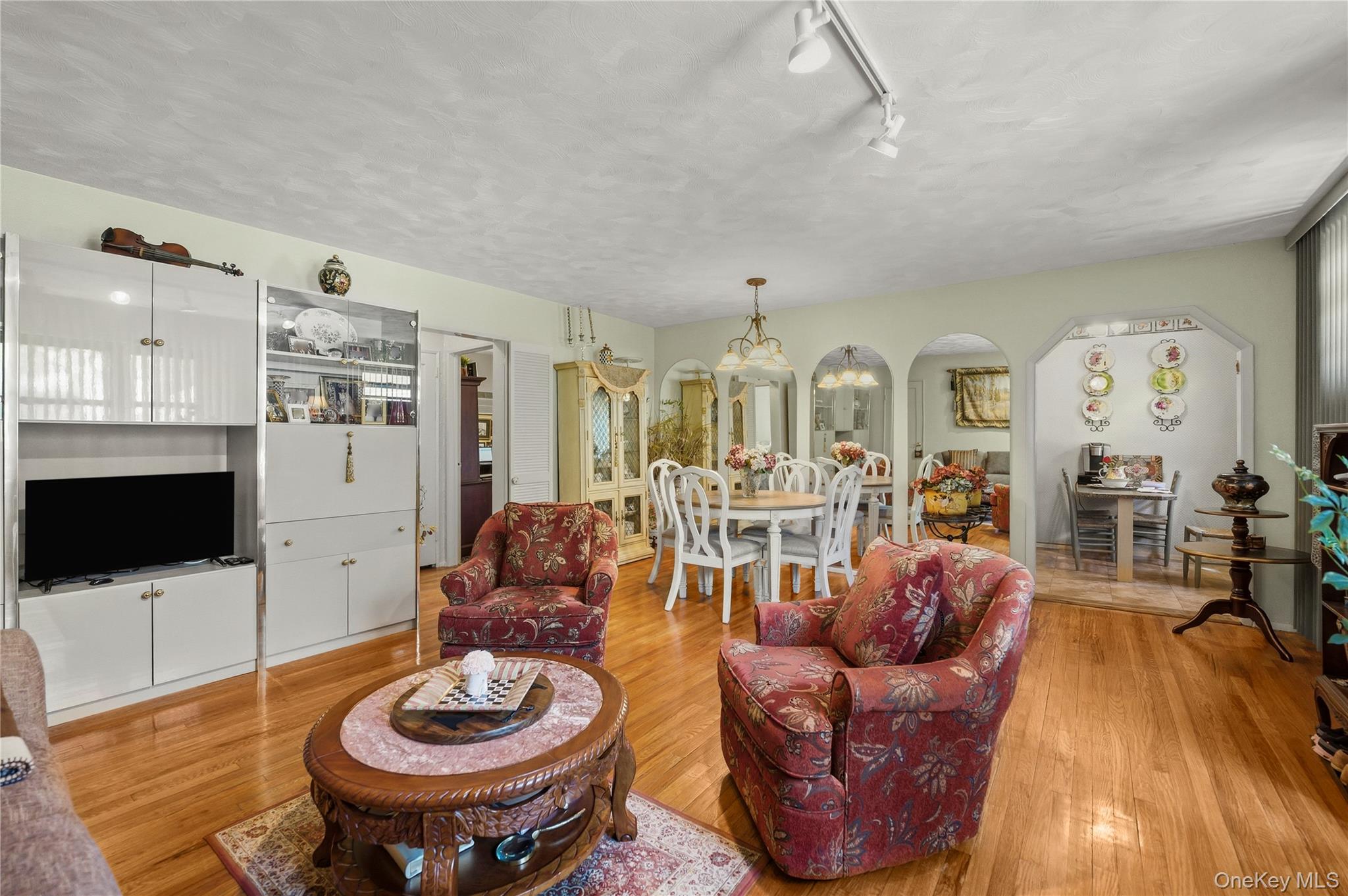 Welcome to a beautiful new availability at Clearview Gardens. Move in ready unit has an open and expansive layout. Sleek hardwood flooring all throughout, large east facing windows in the living room and kitchen animate the entire open living room , dining and kitchen area. There is an in unit washer and dryer as well as dishwasher for your convenience. Quaint Bayside location with serenity and proximity to local shops , transportation and expressways. The two bedrooms are adequate size with additional storage and well lit as well. This is a first floor apartment, the maintenance is 1208 per month with all utilities included.
