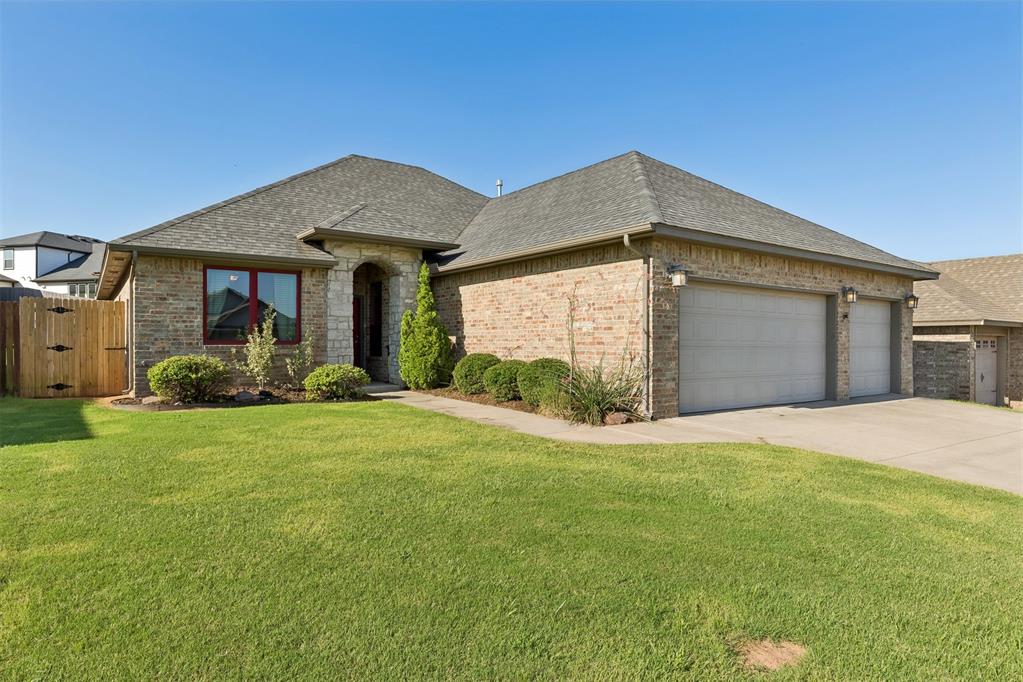 Welcome to this beautifully crafted 4-bedroom, 2-bath home in desirable Covell Valley in Northeast Edmond! This home features open-concept living space with a custom designed media center perfect for entertaining and cozy movie nights. The kitchen includes plentiful space for bar seating, a gas range, contemporary pendant lighting, granite countertops and stylish tile backsplash.Step inside the private primary suite which offers a luxurious retreat in the primary bath with a jetted tub, beautifully tiled shower and double vanity with granite counter tops. Other attractive features include wood flooring, new tankless hot water heater, an oversized 3-car garage and a well-sized covered patio. Located in the sought-after Edmond Public School District and zoned for the new Post Oak Elementary School, this home offers quick access to I-35, shopping, dining, hospitals, and other everyday conveniences. This property is a must see!