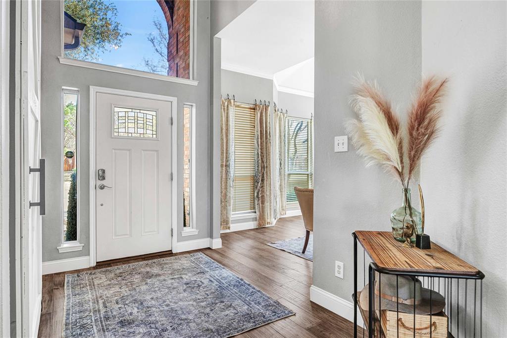 Nestled in the heart of Richardson, Texas, this stunning 4-bedroom, 3-bathroom home offers a perfect combination of style, space, and comfort. Located in a highly sought-after neighborhood, 3203 Grantham Dr boasts a welcoming and spacious layout that is perfect for family living and entertaining. With approximately 3,000 square feet of living space, this home provides ample room to grow, with large, open-concept living areas and well-proportioned rooms throughout.
As you enter, you are greeted by an inviting foyer that leads into the formal living and dining areas, perfect for hosting gatherings or enjoying a quiet evening. The expansive kitchen is a chef’s dream, featuring modern appliances, granite countertops, abundant cabinetry, and a large island for meal prep or casual dining. The adjoining family room offers a cozy space with a fireplace and plenty of natural light, creating the perfect atmosphere for relaxation.
The spacious primary suite is a true retreat, offering a generous bedroom with large windows that provide views of the backyard. The en-suite bathroom is a spa-like oasis, complete with dual vanities, a soaking tub, and a separate shower, ensuring comfort and convenience. Three additional bedrooms provide ample space for family or guests, and two more full bathrooms offer ease and privacy.
Outside, the backyard is an entertainer’s paradise, featuring a covered patio and lush landscaping, providing a serene and private space for outdoor enjoyment. Whether hosting a BBQ, enjoying a morning coffee, or simply relaxing, this backyard offers something for everyone. The home also includes a 2-car garage with plenty of storage space, making it both practical and convenient.
Located just minutes from top-rated schools, parks, shopping, and dining options, 3203 Grantham Dr is not only a beautiful home but also offers unmatched convenience and accessibility. With easy access to major highways, commuting to downtown Dallas or surrounding areas is a breeze.