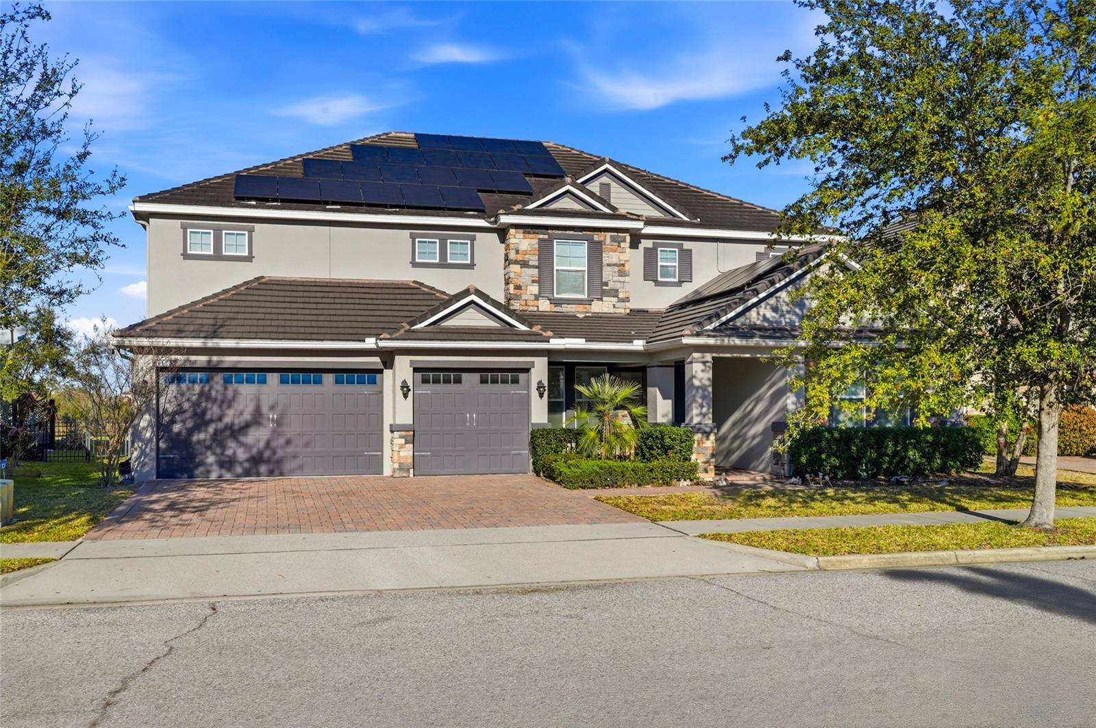 Luxury Lakefront Estate – Windermere, FLDiscover a truly extraordinary lakefront residence located at one of Windermere's most prestigious addresses. Situated on a sprawling 0.75-acre lot, this property impresses with its grandeur, elegance, and impeccable attention to detail.With 8 spacious bedrooms, 9 full bathrooms, and 1 powder room, the home was designed to offer absolute comfort and a sophisticated living experience. Upon entering, the charming front porch leads to a high-ceilinged main living room, creating an imposing and bright atmosphere. Large windows allow abundant natural light, while sliding doors seamlessly integrate the interior spaces with the spectacular outdoor area.The lakeside gourmet space is a true haven for entertainment and leisure, featuring a private pool, a fully equipped summer kitchen, and a spacious area for entertaining guests, all with breathtaking views of the water. On the second floor, a spacious balcony provides enchanting panoramic views of the lake, perfect for contemplative sunset moments.The main floor features luxurious vinyl flooring, adding sophistication and durability. The kitchen is a highlight, equipped with high-quality stainless steel appliances, quartz countertops, spacious and refined cabinets, and a large central island ideal for gathering family and friends. The residence also has two master suites, offering unparalleled privacy and comfort.The garage comfortably accommodates three vehicles, and the property has a solar energy system, providing energy efficiency and long-term savings.Located in a complete community, residents enjoy a swimming pool, tennis court, playground, and tree-lined sidewalks for walking. The house is close to the best schools in the area, as well as the sophisticated shops and restaurants of Windermere, and just minutes from Orlando attractions, including the renowned Walt Disney World.This is a rare opportunity to acquire an exclusive property where luxury, space, sustainability, and breathtaking views meet in perfect harmony.Don't miss the chance to transform this exceptional property into your new home.