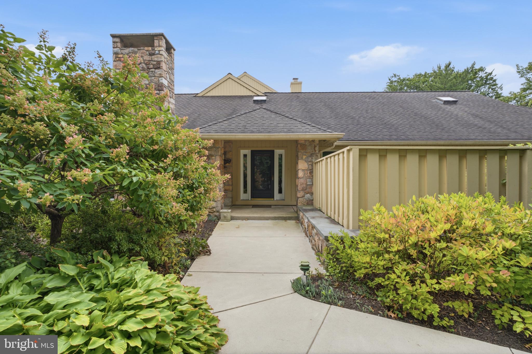 The opportunity you've been waiting for in Bryn Mawr's coveted community of Hermitage!  This spacious ranch style end unit home offers all the perks of 1 level living, an open concept for everyday life and entertaining guests, private patio spaces and room for customization where desired.  Pull into the large private driveway and immediately admire the beautiful landscaped flower beds and view of the community pond. Enter into the foyer and feel at home.  The huge living room with stone fireplace, den/study with custom built ins, the eat-in kitchen with adjacent butlers pantry offer a great flow.  Enjoy your morning coffee, grilling up dinner or evening cocktails on the kitchen patio. The half bath is perfectly tucked off the hallway and so are the bedrooms.  The primary suite is situated among an atrium and has a large full bath with toilet closet, soaking tub and shower, 2 walk-in closets and sliders to a private courtyard patio.  2 additional bedrooms, both with access to outdoor living space, 1 being a 2nd ensuite. The garage loft space with full bath is the perfect bonus room for guests, a gym, larger home office, you name it.  Hermitage is known for its gorgeous setting with walking paths, great HOA lifestyle, tennis/pickleball courts, scenic pond, great exterior spaces to enjoy the pristine landscape and close proximity to all things Main Line and easy access to 76, 476, King of Prussia and Center City.  This is a wonderful opportunity to own a low maintenance piece of the Main Line.  This home is an estate and being sold, as-is.