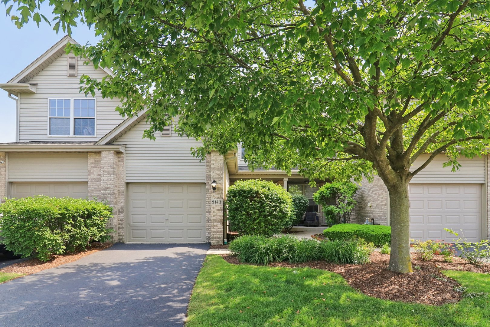 Beautiful remodeled updated townhouse in private Mansfield Court. Open front porch, great for relaxing leads to a spacious foyer. Beautiful kitchen with gray shaker style cabinets, quartz counters, undermount sink & porcelain tiled floor. Newer stainless-steel appliances. Kitchen overlooks the living room / dining room. Living room & dining room have newer high-end luxury vinyl flooring and a 2-story ceiling! Living room opens to a brick paver patio and nice yard area. Big master bedroom with a tray ceiling, a large walk-in closet & a shared master bath access. 2nd floor hall overlooks the 2-story living room. Full unfinished basement with lots of potential. Main level in unit laundry with a sink. Both baths are fully remodeled with newer vanities, lights & tiling. Attached garage with driveway parking too. Newer light fixtures. Newer 6 panel doors. Newer air conditioner. Small desk area on the 2nd floor. Short hike to the commuter train, highway access and shopping. Tinley Park has great parks & community pool. District #140/#230 Schools are all located nearby. Immediate possession. FHA/VA are eligible . Pets are welcome.