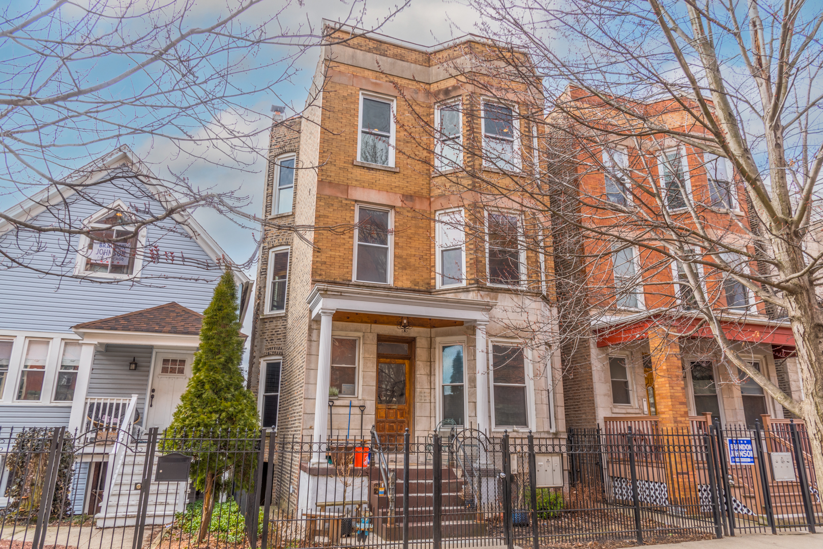 Discover this beautifully renovated top-floor 2 bed / 1 bath home with an additional office nook opening off the living room-perfect for today's lifestyle. Soaring 9.5' ceilings, hardwood floors throughout, exposed brick, original moldings, and vintage details create a warm, timeless feel. The updated kitchen shines with granite countertops, stainless steel appliances, and a classic subway tile backsplash. Relax in the spa-like bath featuring a whirlpool tub. Enjoy the convenience of on-site laundry and an oversized storage area, plus a stunning shared backyard and garden space for outdoor living. Tucked away on a quiet cul-de-sac yet only 3 blocks from the Blue Line and moments from Logan's best dining and nightlife. Garage parking included!