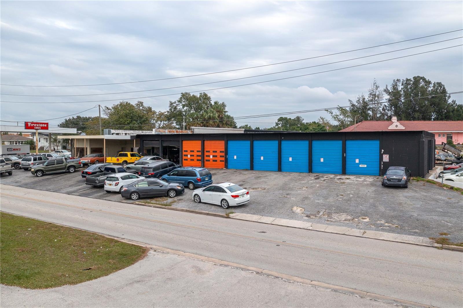 Attention Commercial Investors. Commercial opportunity in Lake Wales, Florida. The parcel size is .6781 acres with large commercial building currently on parcel.  This building is an old Firestone Building. The vacant lot right in the front of the building is also listed for sale. Parcel ID 37-30-01-883000-045052. Access from the road directly to this property from the west, east and south. Great location for future growth in Lake Wales. Call today for your private showing.