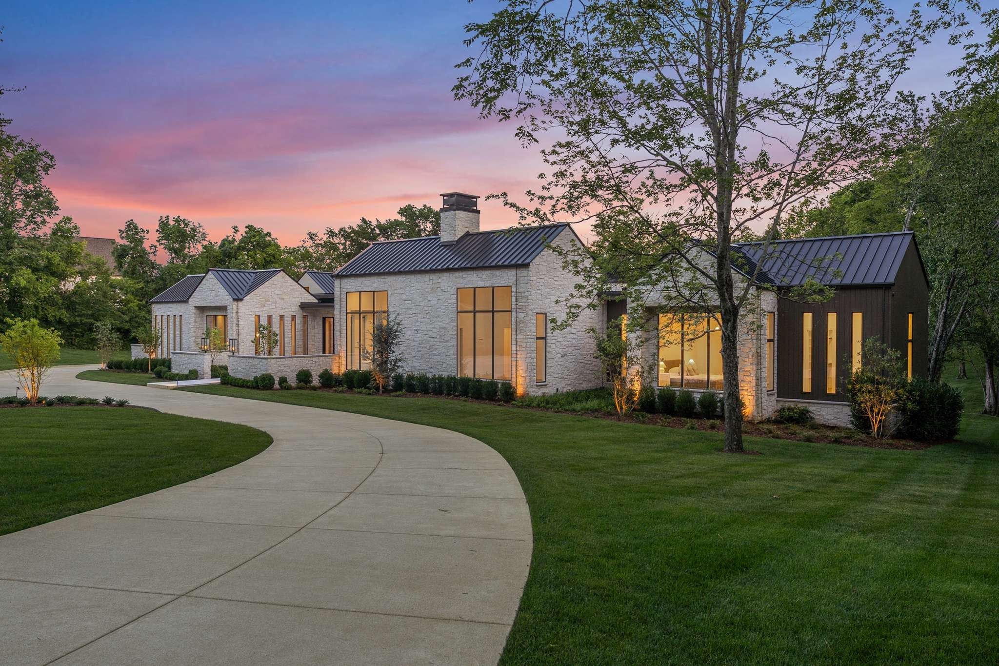 This unique, 1-level opportunity by Craftsman Residential is situated on 3.6 private acres with a 1-story living floor plan that overlooks daily sunsets over 2000+ sq ft of outdoor living space including a pool/spa, grilling area, lanai and alfresco dining. As you walk through the courtyard and enter into the gallery hall, guests will be awestruck by the views from your grand kitchen/great room overlooking your infinity edge pool and private backyard. Your kitchen as well as your large working pantry features Wolf and Sub Zero appliances while your house lighting is controlled by a centralized switching system from Lutron.   Just off the great room, you enjoy a separate TV room with bar and icemaker of your choice as well as pocketing slider doors that open into the wall, offering indoor outdoor living onto your power screened lanai that overlooks the pool and backyard as well. In the owners wing, the primary suite has an oversized bedroom with a sitting area, bathroom with heated tile floors, zero entry dual steam shower, separate closets and an oversized laundry room just around the corner.  In addition, you have a home office with soaring windows and elevated ceilings along with a 2-story fireplace and an oversized dining room overlooking your courtyard and private front yard.  Finishing out the first floor are  three secondary bedrooms with ensuite bathrooms and walk-in closets. Over your 4-car garage, you have a fifth bedroom, loft and home gym just off your friend's entry where your separate mudroom hides the clutter of daily living. Want more?  See video links and details for information about the large amount of additional zoning capacity you have to build an accessory structure for your hobbies, health, or entertainment.
