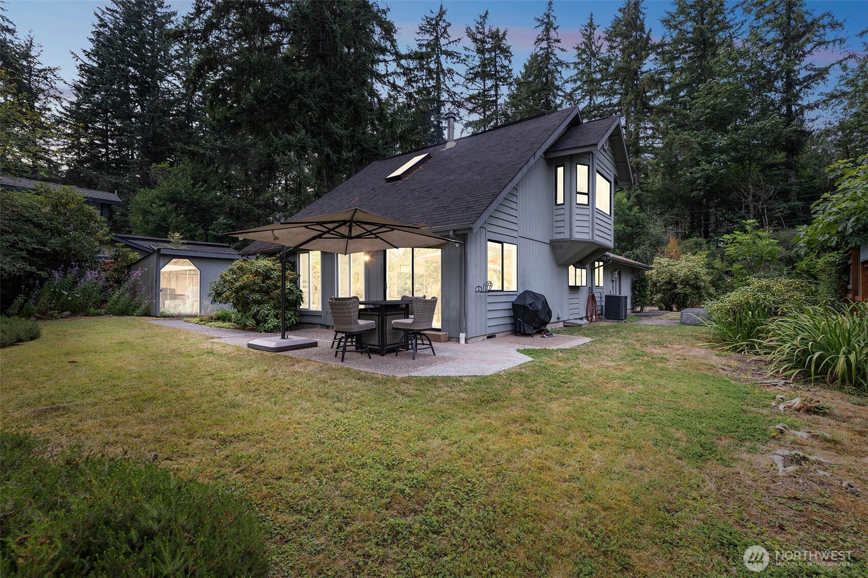 Your Waterfront Sanctuary Awaits!  Imagine waking up to bald eagles soaring overhead, great blue herons fishing in the shallows, and playful river seals lounging on the shore. This enchanting waterfront home on Eld Inlet isn't just a house—it's your front-row seat to nature's daily show, where spawning salmon return each season and wildlife thrives right in your own backyard. This contemporary craftsman gem offers the ideal blend of easy-care living and breathtaking natural beauty. Floor-to-ceiling windows frame ever-changing water views that flood the space with natural light. Your great room invites you to cozy up by the fireplace or open the French doors to the patio, where you can sip your  coffee while watching the inlet come alive!