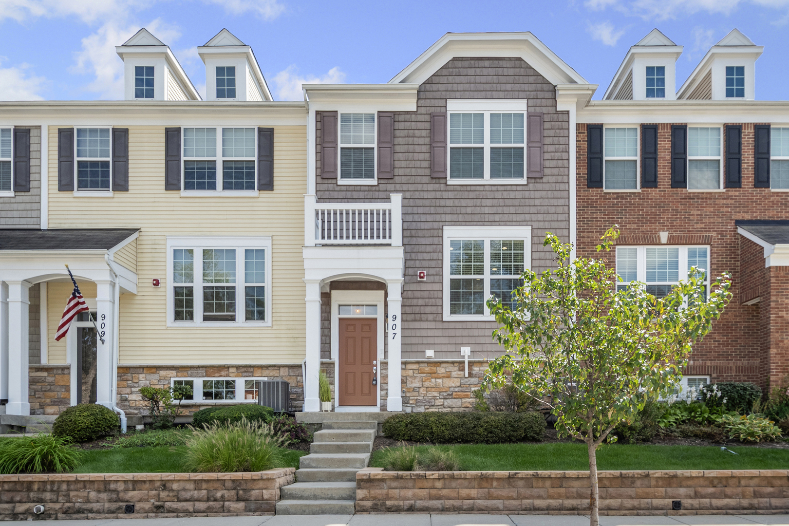 Location, Location, Location - look no further than this freshly painted 3-story townhome in hot Downtown Arlington Heights (DTA). Situated in Arlington Crossings (only 2 units have sold this year), the main level is perfect for both daily living and entertaining. The kitchen has abundant cabinet, counter, and pantry closet space with new: hardware, under-counter lighting and brand new sleek fridge. Plus, space for your coffee bar and/or dining table. The living room is sun-filled with space for a large, comfortable sectional and access to the south-facing freshly painted balcony. Upstairs includes hardwood throughout with 3 bedrooms, including a primary with large walk-in closet and ensuite bath, plus a hall bath. Both upper baths have new: faucets, hardware and lighting. There are so many lighting upgrades throughout: recessed lights are now LED, with dimmers plus new: sconces, bath and entry light fixtures to update and elevate this home. Regardless of the weather, pull right into your attached 2-car garage that leads to a dedicated laundry/utility room and stairs to the main level. Fall in love with the efficient layout, leaving no wasted space and volume ceilings on the main level. Brand new owner driveways & rear alley currently being finished-no special assessment. Arlington Heights is a top NW suburban destination for shops, restaurants and theater. Plus, there's a nearby Metra stop, Mariano's, award-winning library, and amazing park district. Welcome Home!