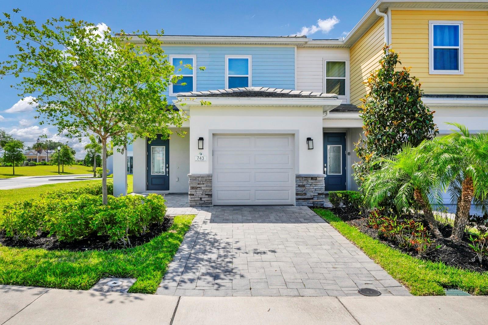 Looking for your next Florida Vacation Home, Investment Property or Primary Home? Look no further! This Beautiful 3-bedroom, 2.5 bathroom Townhome Located within the highly sought-after gated Resort-Style Reunion Resort Community is A Must See! This Beautiful Home located adjacent to the 18-Hole Jack Nicklaus designed Golf Course and Clubhouse. This amenity rich community includes a waterpark, lazy river, multiple pools, restaurants, miniature-golf, pickle-ball, tennis, bocce ball, foot golf, walking trails and playgrounds. When you step inside this amazing home, you will instantly fall in love and be blown away by the high ceilings and oversized doors. The Gourmet Kitchen includes lots of counter space with a lot of room to cook amazing meals and entertain. The Kitchen is equipped with quartz countertops, stainless appliances, and upgraded cabinets. The open floor plan provides ample space for entertaining and has ceramic tile throughout the first floor. There is also a half bath conveniently located adjacent to the Kitchen. As you proceed to the 2nd floor, you will feel as though you have transported into an unbelievable Disney Palace. The Master bedroom with a walk-in closet, includes an Ensuite Bathroom with dual vanities and a walk-in shower. For your convenience, the Laundry Room is located on the second floor next to the third bathroom. Reunion Resort is a 2,300 acre Resort and Golf Community with three championship signature golf courses, a multimillion dollar waterpark located just a few miles away from all of the Disney and Universal Studios Themed Parks. It is only 20 minutes to the Orlando International Airport. Enjoy a wealth of resort amenities, this is your chance to own in one of Orlando’s premier vacation communities. Don’t wait—schedule your tour today!