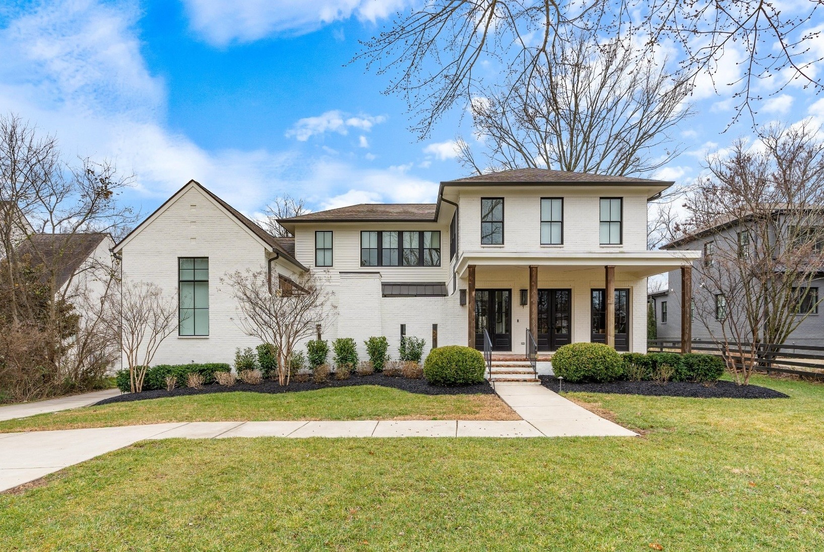 Welcome to this breathtaking luxury residence in the prestigious Oak Hill neighborhood, where sophistication and style meet comfort and privacy. This stunning home boasts a seamless blend of elegant finishes and modern design, creating an inviting atmosphere throughout. The open floor plan flows effortlessly, with gleaming hardwood floors, custom millwork, and oversized windows that frame the beautiful surroundings. The chef’s kitchen is a culinary dream, complete with top-of-the-line appliances, custom cabinetry, a large central island, and sleek quartz countertops. Whether preparing a casual meal or hosting a dinner party, the kitchen opens seamlessly to the dining and living areas, making entertaining a breeze. The primary suite offers a serene retreat, complete with a luxurious en-suite bathroom featuring a soaking tub, glass-enclosed shower, dual vanities, and an expansive walk-in closet. Five additional generously sized bedrooms each offer their own en-suite bath, providing ultimate comfort and privacy for family and guests. Dedicated laundry spaces on both floors add to this home's functionality.  Step outside to your private sanctuary. A tranquil, secluded courtyard offers the perfect setting for quiet moments or gatherings with loved ones around the fire, while the backyard features a sparkling pool and relaxing spa with a turf surround, a beautifully landscaped, fenced-in yard—ideal for outdoor entertaining, play or enjoying peaceful moments in the sun. The expansive patio area is perfect for alfresco dining or lounging by the poolside. Additional highlights of this home include a private and quiet bonus/media room, walk-in storage as well as a three-car garage with ample storage space.  Located in the coveted Oak Hill neighborhood, this home offers a rare combination of luxury living and privacy, while being just minutes from top-tier schools, parks, shopping, and dining. Experience the pinnacle of Nashville living in this extraordinary estate!