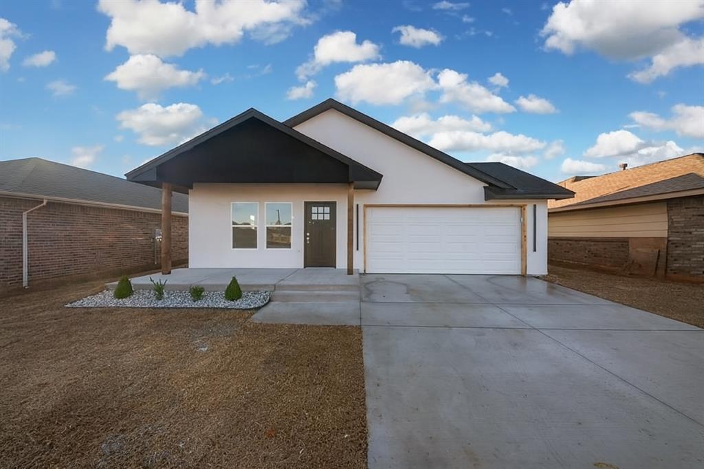 Stop what you’re doing — this brand-new north OKC home is loaded with upgrades you never expected to find at this price point. With tile throughout and no carpet anywhere, this thoughtfully designed new build delivers a modern, elevated feel from the moment you walk in. The open-concept layout centers around a beautifully upgraded kitchen featuring a large island, Frigidaire appliances, premium fixtures, and a separate walk-in pantry. Vaulted ceilings and a sleek electric fireplace make the living area feel bright, spacious, and inviting.The primary suite is a standout with a custom accent wall and built-in sconces, along with a spa-level en suite offering a massive walk-in tiled shower, oversized soaking tub, LED mirrors, dual sinks, and a three-tier closet. Both bathrooms include fully tiled showers and high-end fixtures, and the home also provides a dedicated laundry room and a true two-car garage.Outdoor living is just as impressive, with a huge covered back patio, a fully fenced backyard with a brand-new fence and gate, and a wide covered front porch perfect for enjoying sunrise and sunset views.All of this sits in one of the most convenient locations in the city — minutes from Top Golf, Chisholm Creek, Costco, Mercy and Kilpatrick hospitals, major restaurants, shopping, and effortless highway access. This home brings together modern design, unexpected upgrades, and a lifestyle that’s hard to match in north OKC.