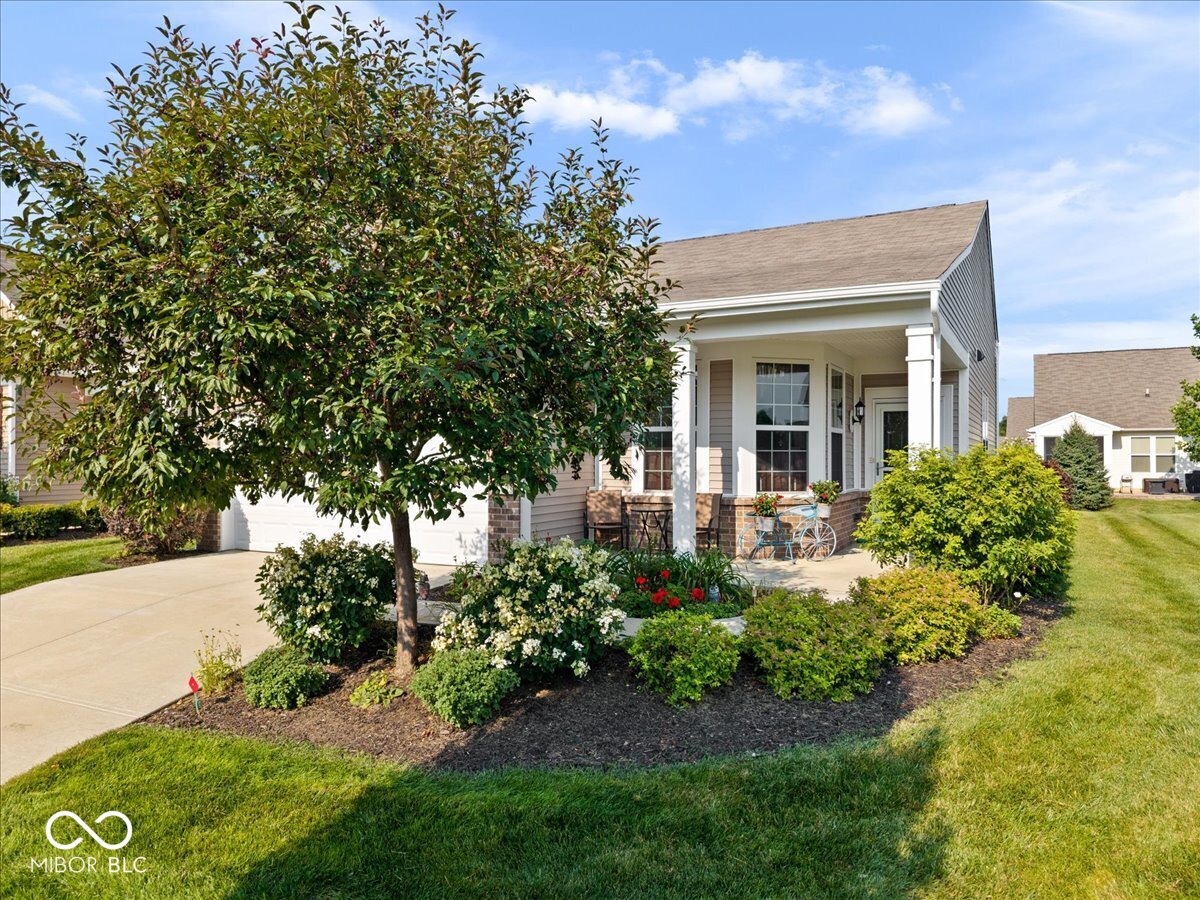 Ready to trade the lawnmower and the honey-do list for poolside afternoons, and a social calendar packed with things to do? This beautifully maintained 2-bedroom, 1,336 sq ft home in Del Webb's popular 55+ community is ready and waiting.  Step inside and the pride of ownership is clear right away. Gorgeous LVP flooring runs throughout - easy on the eye and easy to maintain. The open living-dining combo is filled with natural light and large enough to accommodate guests and friends.   Stainless steel appliances complete a kitchen that's as practical as it is good-looking, with a beautiful bay window, making it the perfect spot for morning coffee or an evening wind-down.   A master suite with separation from the second bedroom give you some relaxing space, and both bedrooms offer room to move, and plenty of storage.  And when you're after some fresh air, step out to your own private patio - tucked behind mature landscaping for a peaceful spot to relax.  The real draw, though, is what's beyond your front door. Del Webb is a genuinely active adult community - resort-style clubhouse, sparkling pool, tennis and pickleball courts, plus more clubs than you'll have days in the week for. Cards, fitness classes, book clubs, or simply getting to know neighbours - it's all on offer.  Low-maintenance living. Top-notch amenities. This isn't just a house - it's a lifestyle upgrade.  Welcome Home to Del Webb - Easy Living for Your Next Chapter