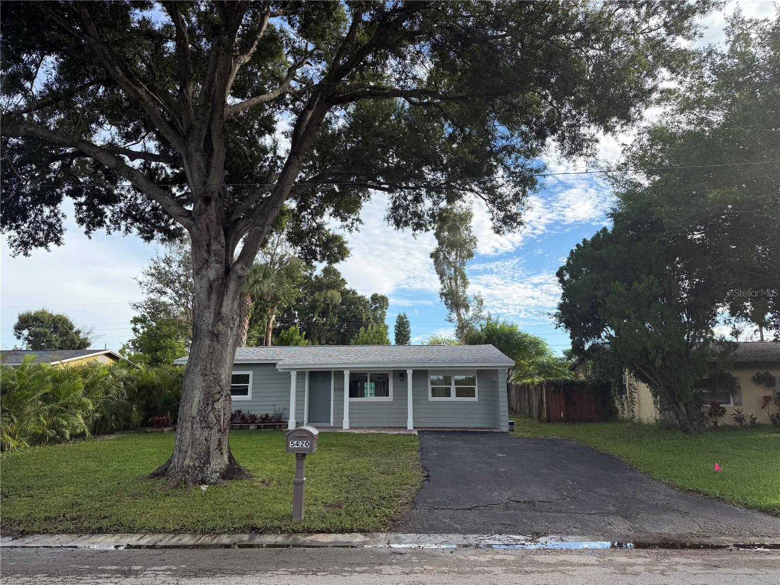Welcome home to this beautifully renovated home in Pinellas Park!   Come take a look at this turnkey home option, recently updated - both inside & out.  Buyers will appreciate the luxury vinyl plank flooring that flows seamlessly through the home, connecting the Living Room & Kitchen. BRAND NEW KITCHEN! New Cabinets, Granite Countertops, and New Appliances.  NEW WINDOWS.  Gorgeous finished Bathroom features white and grey tile, herringbone flooring tile, and New vanity.  Brand New Shingle Roof (2026), Newer AC (2024).  Indoor Laundry room off of the Kitchen with newer Electrical panel. Large backyard, New Exterior paint, and fresh landscaping.