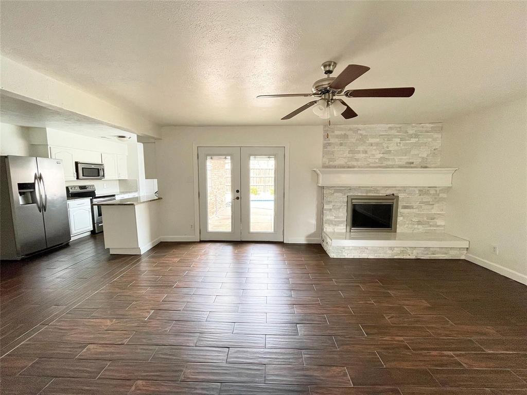 Updated Single Story 4 Bedroom with huge diving pool in a big back yard. A rare find!  Updated Kitchen with granite and backsplash.  Custom upgraded bathrooms.  No carpet! Wood look tile in common spaces. Dining space has separate cabinets with granite and glass tile backsplash. High Ceilings and large open dining and second living space.