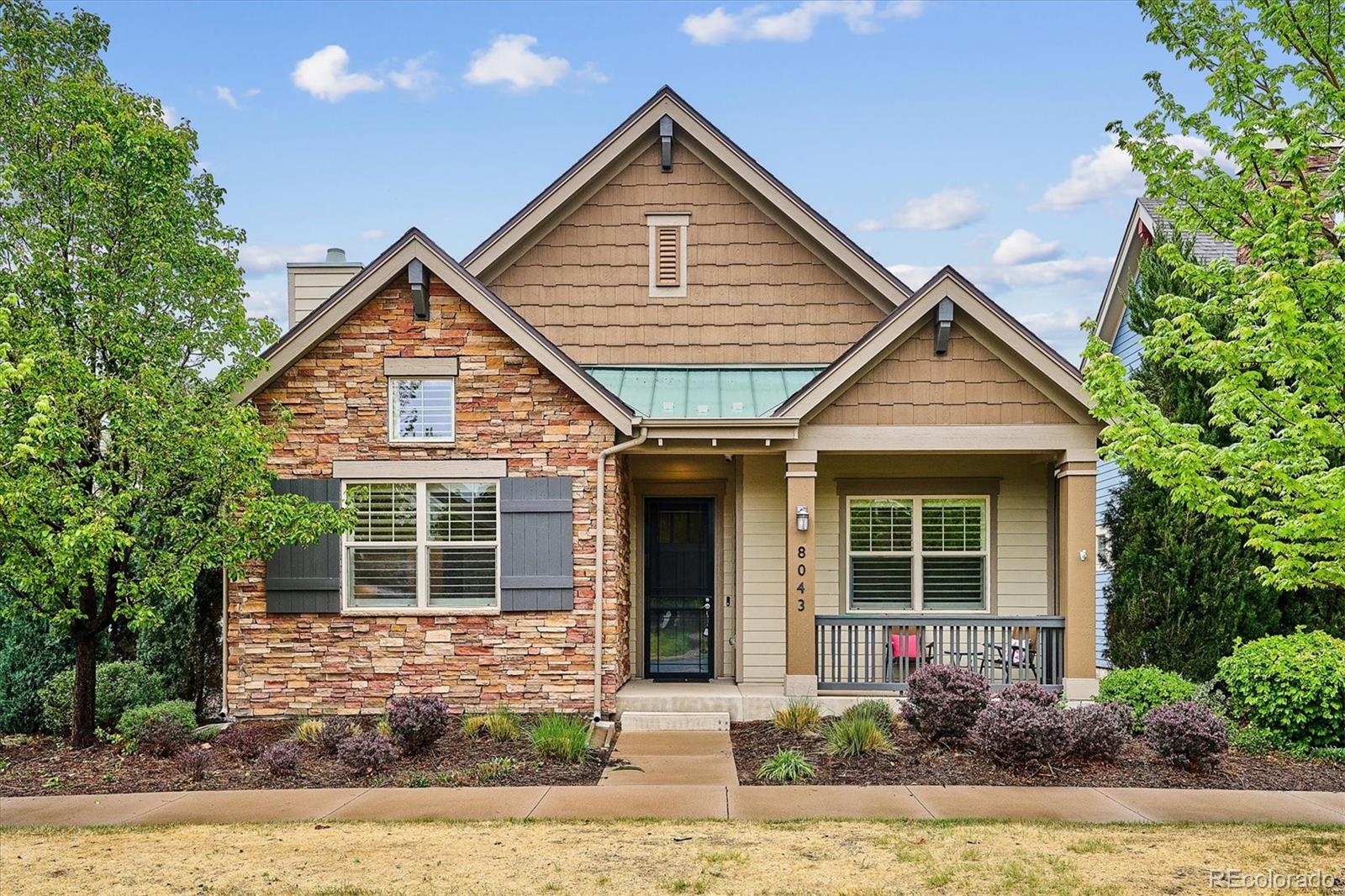 Nestled in the sought-after Conservatory Green neighborhood of Central Park, this beautiful south-facing Boulder Creek ranch blends thoughtful design, timeless finishes, & low-maintenance living. Fresh paint, custom shudders, & rich cherry hardwood flooring welcome you inside, where the open-concept main floor is anchored by a stunning gourmet kitchen featuring upgraded cherry cabinetry, granite counters, stylish glass tile backsplash, under cabinet lighting, SS appliances, generous pantry, oversized prep island, & the luxury of 2 sinks, a touch any chef will appreciate! Overlooking the kitchen, the great room creates the perfect setting for entertaining, & everyday living. The sunlit primary retreat offers a huge walk-in closet & spa-inspired en suite bath w/radiant heat floor, while the secondary main-floor bedroom w/glass door & a coffered ceiling makes an exceptional office or guest suite. An addt'l main-floor full bath adds convenience, while a large mudroom w/custom cabinetry leads to the laundry room with utility sink & ample storage. Downstairs, the finished basement is the hub for fun, featuring an expansive family room ideal for movie nights, bespoke built-ins, charming wet bar for snacks & bevies, 3/4 bath, 2 generous bedrooms, as well an oversized fun retreat/game room sure to please! Outside, enjoy a private backyard escape with epoxy floor covered patio, extended flagstone entertaining space, built-in BBQ & raised irrigated garden beds, while the HOA maintains front landscaping & sprinklers for true lock-and-leave ease. Addtl upgrades include whole-house humidifier, int in-wall & exterior speakers, stairwell lighting, floor outlets, ceiling fans, dimmer switches, epoxy garage flooring, custom garage cabinetry & hanging storage, and a comprehensive security system w/door and window sensors, front porch camera, & video doorbell. All just minutes from The Avenues at Northfield, where shopping, dining, & entertainment are always within easy reach.