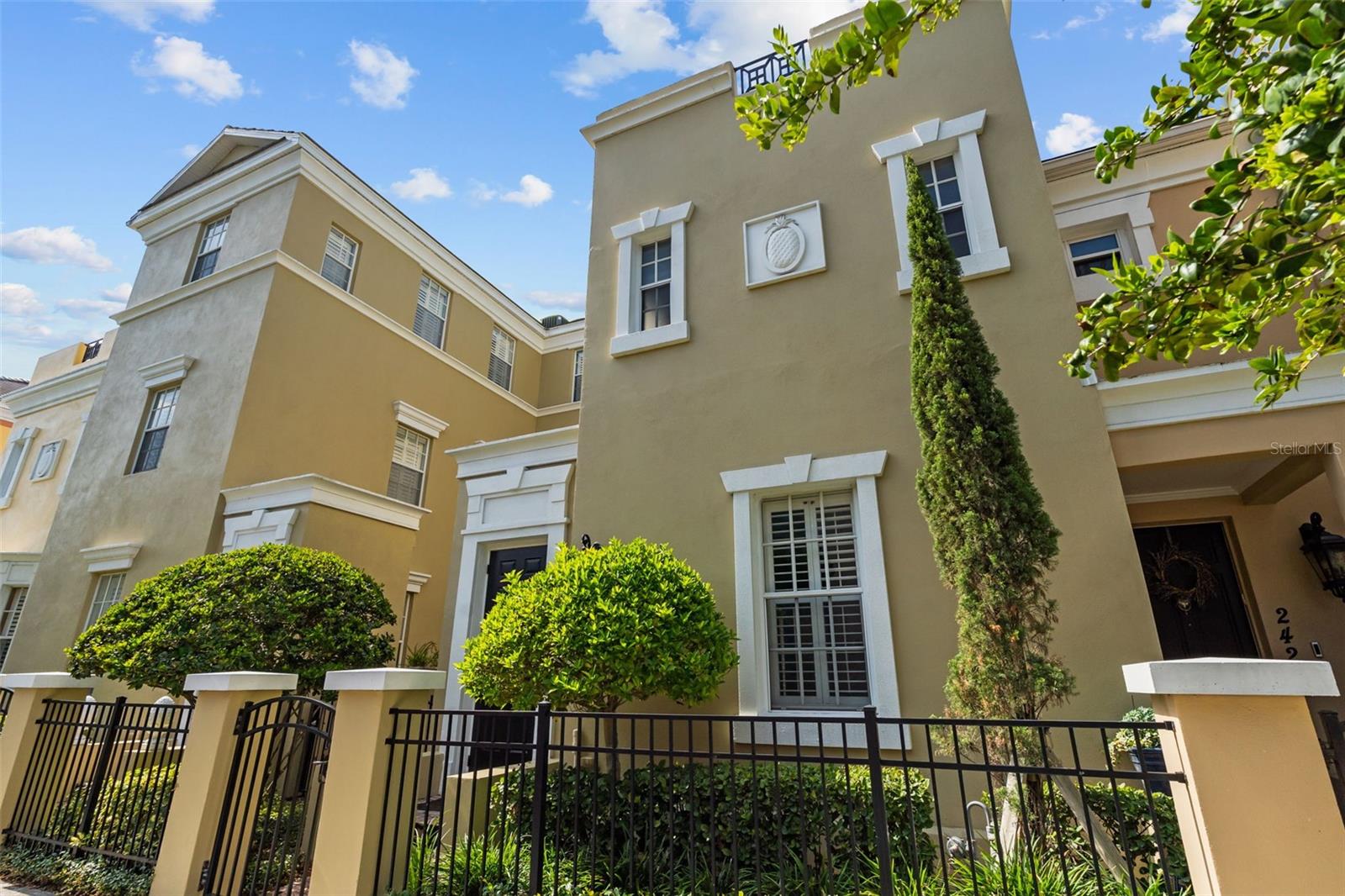 Welcome to this beautiful 3 bedroom, 2.5 bathroom townhome in the heart of Hyde Park, one of South Tampa's most desirable neighborhoods. With 1,739 square feet of well-designed living space, this home offers the perfect combination of comfort, style, and convenience.Inside, you'll find hardwood floors, a spacious living area with a gas fireplace, and a kitchen featuring granite countertops, stainless steel appliances, a gas cooktop, and plenty of cabinet space. French doors lead to a private courtyard that's perfect for grilling, relaxing, or entertaining friends.Upstairs, the primary suite features a custom walk-in closet and an ensuite bathroom with dual vanities and a soaking tub. Two additional bedrooms, a flexible loft space that works well as a home office or second living area, and an upstairs laundry closet complete the second floor.One of the standout features of this home is the oversized rooftop terrace with incredible views of Downtown Tampa and South Tampa. Whether you're enjoying the hot tub, grilling with friends or creating your own rooftop garden it's a space that's hard to find and even harder to leave.The home also features a new A/C system installed in 2025, giving the next owner added peace of mind.Additional features include a two-car garage and access to the community pool.Located just minutes from Hyde Park Village, Bayshore Boulevard, Downtown Tampa, Tampa General Hospital, MacDill Air Force Base, and some of the area's best restaurants and shopping, this is a rare opportunity to own a townhome in one of Tampa's most sought-after locations.