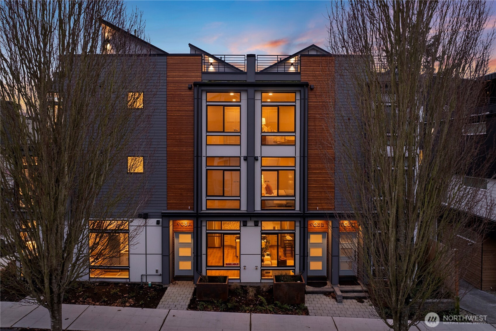 1-year lender paid rate buydown incentive! Welcome to Arden, a boutique collection of modern homes by MRN Homes in an ideal pocket of Ballard. This light-filled residence offers a well-designed open-concept layout with expansive windows & refined modern finishes. The chef-inspired kitchen features quartz counters, gas range & locally crafted cabinetry, flowing seamlessly into the living & dining spaces. Upstairs, enjoy a spacious primary suite with spa-inspired bath, plus a secondary bedroom & bath. Your private rooftop deck offers gas, water & electrical connections, creating effortless indoor-outdoor living—perfect for BBQs, entertaining or unwinding. Tucked along a peaceful, tree-lined street just moments from Ballard’s cafés, restaurants, breweries, boutiques & Farmers Market, with the Ballard Locks, waterfront & Golden Gardens nearby. Not a condo + no HOA dues. An exceptional combination of value, style & the best of Ballard living.