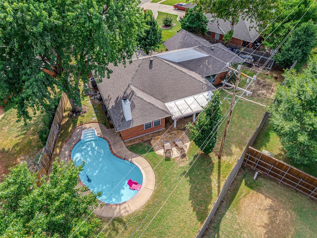 Back on Market to no fault of the sellers! Buyers never deposited Earnest Money, now is your chance!! This cute Edmond home, with over 2000 sq ft, blends everyday comfort with entertaining made easy! This gem truly has it all—4 bedrooms (or 3 bedrooms plus a dedicated office), 2 full baths, & 2 living areas designed for both entertaining and curling up to unwind.
From the moment you walk in, the bright open, flowing layout invites you to stay. One living space is perfect for movie nights & laughter, while the other offers the flexibility of a game room, playroom, or a reading room. The kitchen is unbelievably functional, showcasing granite countertops, tons of storage, a new stove (2024), and plenty of prep space for everything from holiday feasts to weeknight takeout.
Out back is where the fun really begins! Your private oasis includes a sparkling in-ground pool, updated in 2024 with new equipment & a Loop Loc pool cover. Don't miss the oversized yard perfect for gardening and even the possibility of your own chicken coop! Whether you’re hosting summer cookouts, cooling off after a long day, or enjoying a quiet evening under the stars, this backyard will feel like your personal retreat. In the front you have an huge covered front porch and the thickest grass you will ever see! 
Thoughtful upgrades mean peace of mind: Kohler whole-home generator (2025), new carpet (2024), garage door (2024), storm doors (2023), sprinklers in front (2023), ceiling fans (2020–2024), roof (2021), AC/HVAC (2021), & durable vinyl siding (2010). With so many big-ticket items already taken care of, you can move right in and start making memories.
This home doesn’t just check boxes—it creates possibilities. Space to work from home, room to entertain, updates where they matter, tons of storage, & the backyard everyone will want to visit and you won't want to leave. Don’t wait—homes like this are rare, & once you step inside, you’ll see why it’s the one you’ve been searching for!