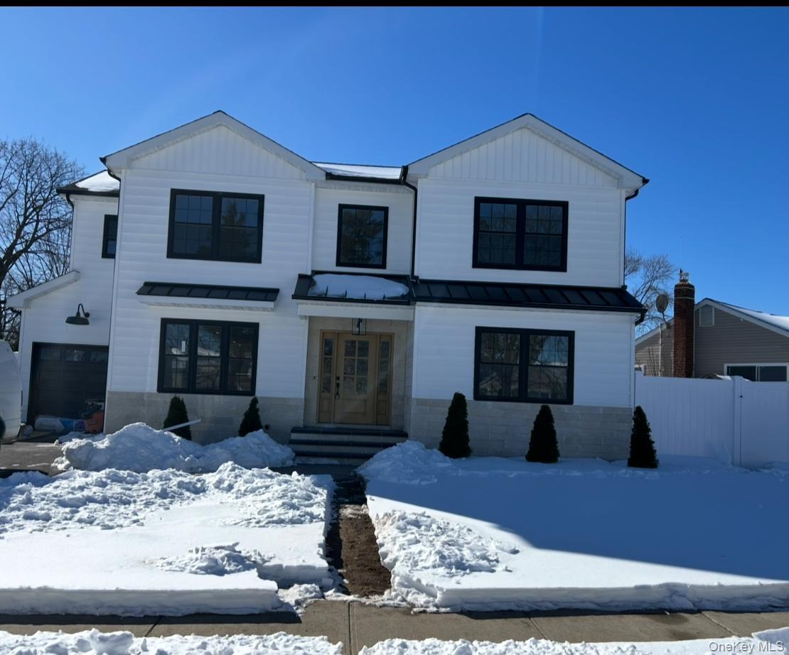 Welcome To This Stunning New Construction In The Heart Of Bethpage! This Custom Designed Center Hall Colonial Features 5 Bedrooms and 3 1/2 Bathrooms. First Floor Open Concept Living with 1/2 Bathroom, Family Room With A Gas Fireplace, Gorgeous Kitchen With Custom Cabinetry, Island With Built In Microwave And Stainless Steel Appliances. There Is Also An En Suite Bedroom On This Floor. All With Beautiful Hardwood Floors And Beautiful Crown Molding As Well As Wainscotting On The Extra Wide Staircase Leading To The Second Floor. On The Second Floor You Will Find A Beautiful Primary With En Suite, 3 Additional Bedrooms with Very Large Closets In All. A Beautiful Shared Hallway Bathroom As Well As Laundry, Brand New Washer/Dryer Installed 2/10/26. No Expense Has Been Spared. Must See In Person To Appreciate The Beauty Of This Home. There Is Also A Large Basement With Separate Entrance. Professional Photos And Video to Come Soon.