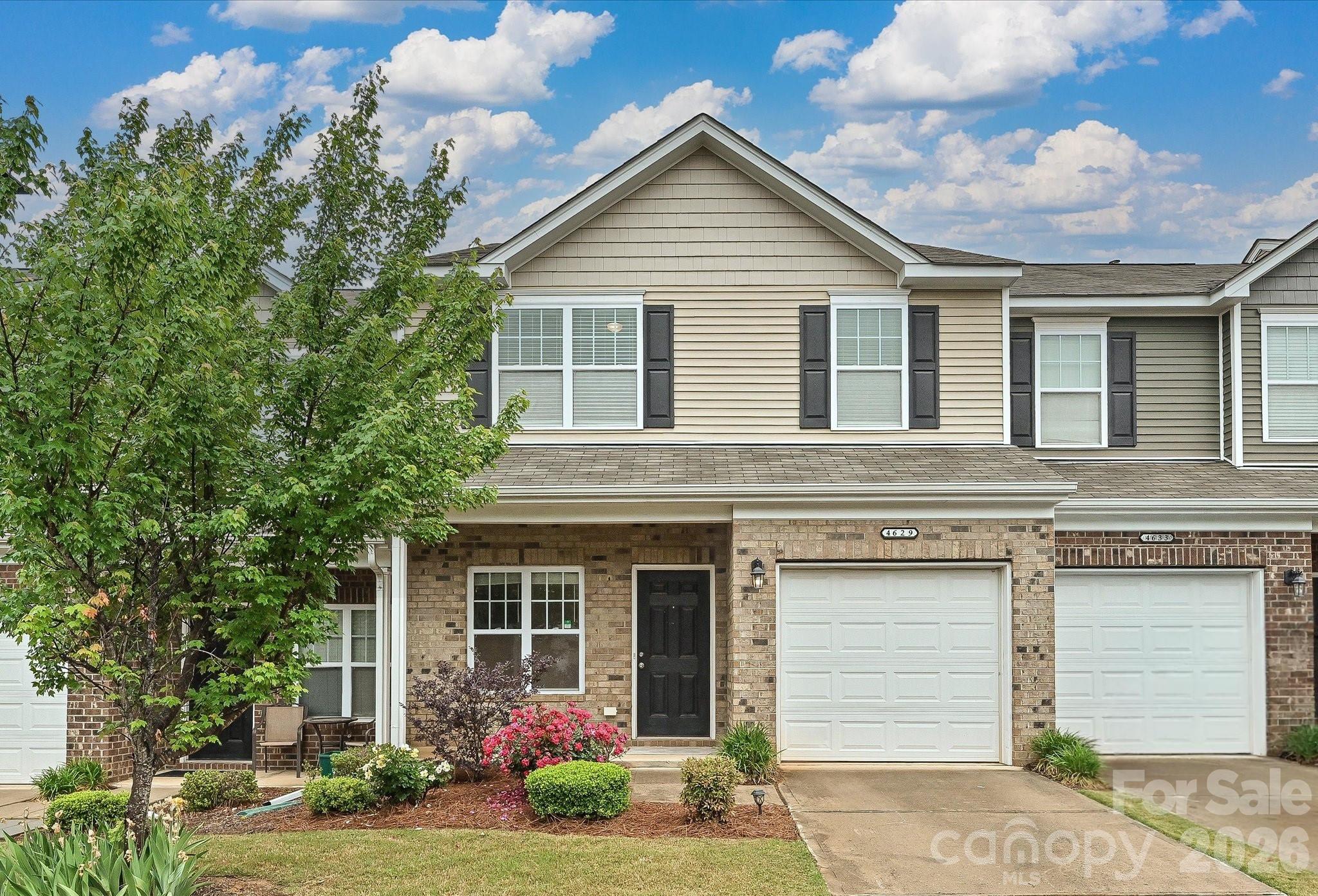 Located in a beautiful community just minutes from I-485 with easy access to I-77 and I-85, this well-maintained townhome offers a perfect blend of comfort and convenience. Featuring 2 BR, 2.5 bath, and a versatile loft, it provides an inviting and spacious layout. The main level showcases a large entryway, deep storage closet, and engineered hardwood floors throughout. SS appliances, granite countertops with bar, white cabinetry in the kitchen, and a bright breakfast area opens to the back patio and overlooks the great room. Upstairs features an open loft, a spacious primary suite with a walk-in closet and an attached study/office, a secondary bedroom, a full guest bath with soaking tub, and a laundry room.  HOA dues include lawn care, water and sewer, exterior maintenance, as well as access to the community clubhouse, fitness center, and outdoor pool. Refrigerator and washer/dryer convey. Enjoy the comfort, convenience and all the community amenities this home has to offer! Move-in ready and truly a must-see!!