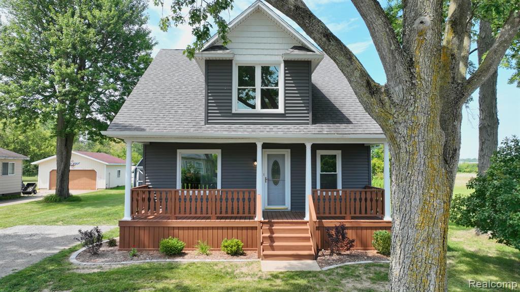 Stunning 4 Bedroom Modern Makeover on Over Half an Acre! - Looking for space, style, and peace of mind? This completely renovated 4 bedroom, 2 bath beauty offers 1,700 square feet of thoughtfully designed living space, nestled just outside city limits on a .64-acre lot. From the brand-new windows, siding, furnace, and hot water heater to the fully remodeled kitchen with gleaming stainless steel appliances, recessed lighting, and tons of storage, every inch has been updated with care and quality. Unwind on your full-length covered front porch — the perfect spot for morning coffee or winding down in the evening. With a modern layout, stylish finishes, and room to breathe, this home delivers the lifestyle you've been dreaming of. Turn the key and move right in — this one won't last!