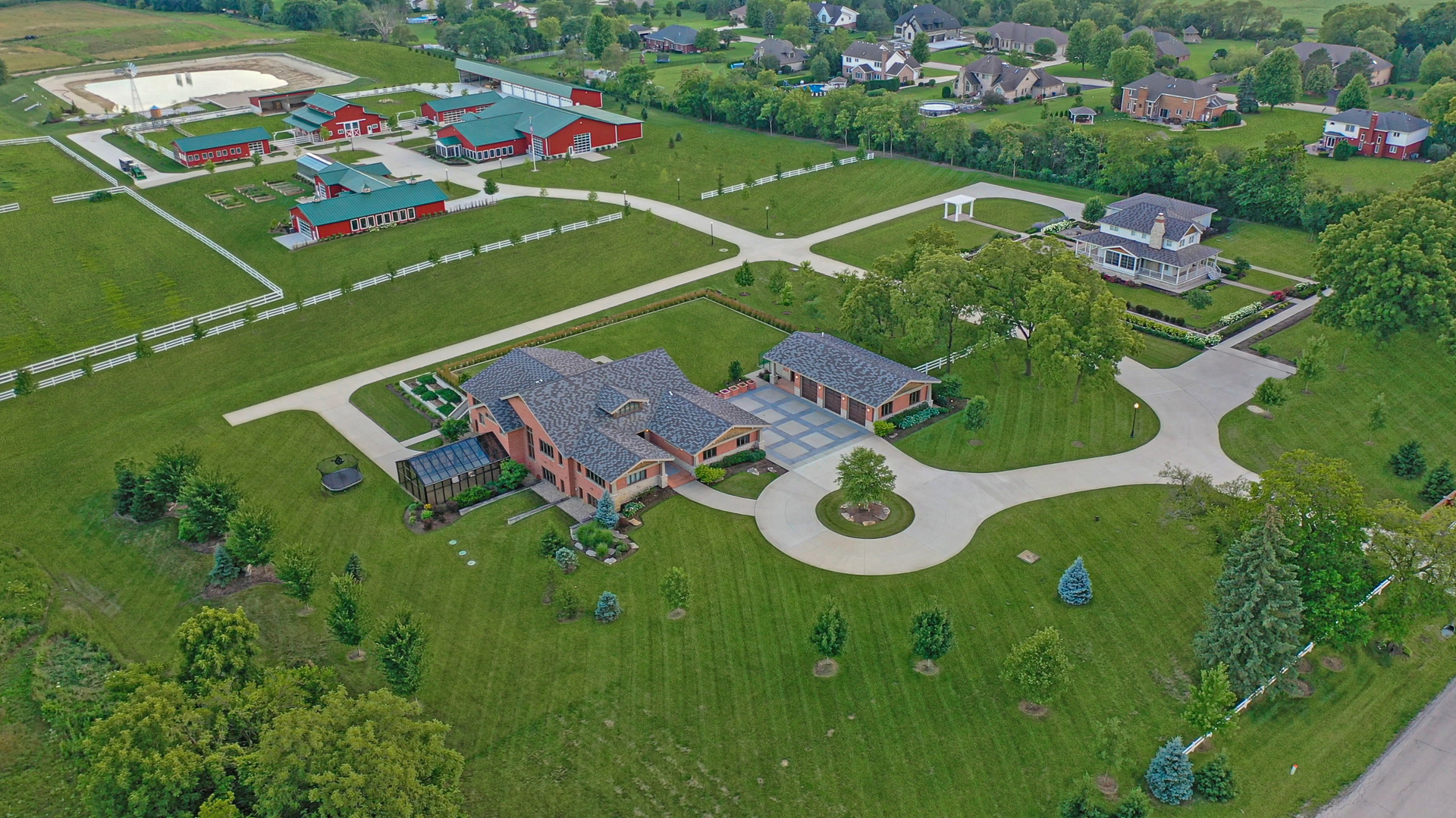 BUY OF A LIFETIME! Imagine LIVING, RELAXING, and ENTERTAINING on this incredible 35 ACRE ESTATE which includes TWO LUXURY HOMES (TOTAL: 9 bedrooms, 10 full baths and 2 half baths combined). Enjoy a lifestyle of luxury and privacy in this unbelievable offering that can not be replicated at this price! Built with uncompromising quality and the absolute highest attention to detail, this ONE OF A KIND offering includes a spectacular, custom estate RANCH home on 6.06 acres - ZONED E1 Single Family Estate PLUS a Victorian MODERN FARMHOUSE/2,644 sq. ft. on 29.46 additional acres zones A1 agricultural. Other buildings offer incredible FLEX SPACE to customize for your own needs and include: CLUBHOUSE/11,180 SF, SCIENCE AND LEARNING CENTER/5,460 SF, CHICKEN COOP MANSION/2,108 SF, TOOL SHED/2,108 SF, STORAGE BUILDING/6,400 SF, and ANIMAL SHELTER 1,196 SF. Imagine hosting life's most special moments/events in your private 11,180 SF clubhouse/event space complete with commercial kitchen, conference room, wet bar, outdoor kitchen and expansive dining area with soaring ceiling and retractable awnings. Homes and all buildings were constructed with no expense spared are ULTRA UPGRADED and include high end fixtures, finishes, appliances, and RADIANT HEAT. Garage/covered parking for 30 plus vehicles on property. The possibilities are endless and the FLEX SPACE can be used for classrooms, offices, conference rooms, banquets, home business, storage, prep kitchens, party rooms, workshops, crafts, auto repair, RV storage, car collections, boat storage, and SO MUCH MORE! Conveniently located, this property is just minutes from expressway access, approximately 50 minutes from downtown Chicago and Midway airport and 10 minutes from Silver Cross Hospital. Schedule your appointment for a private showing of this magnificent estate. Must walk grounds to truly appreciate everything this property has to offer. Measurements are for the main house. Full brochure which includes measurements for the Victorian guest house available upon request. Mokena mailing address but is within the corporate limits of Homer Glen. WATCH THE FULL LENGTH VIDEO. One of the most incredible offerings to enter the Illinois marketplace! Make this legacy property yours today!