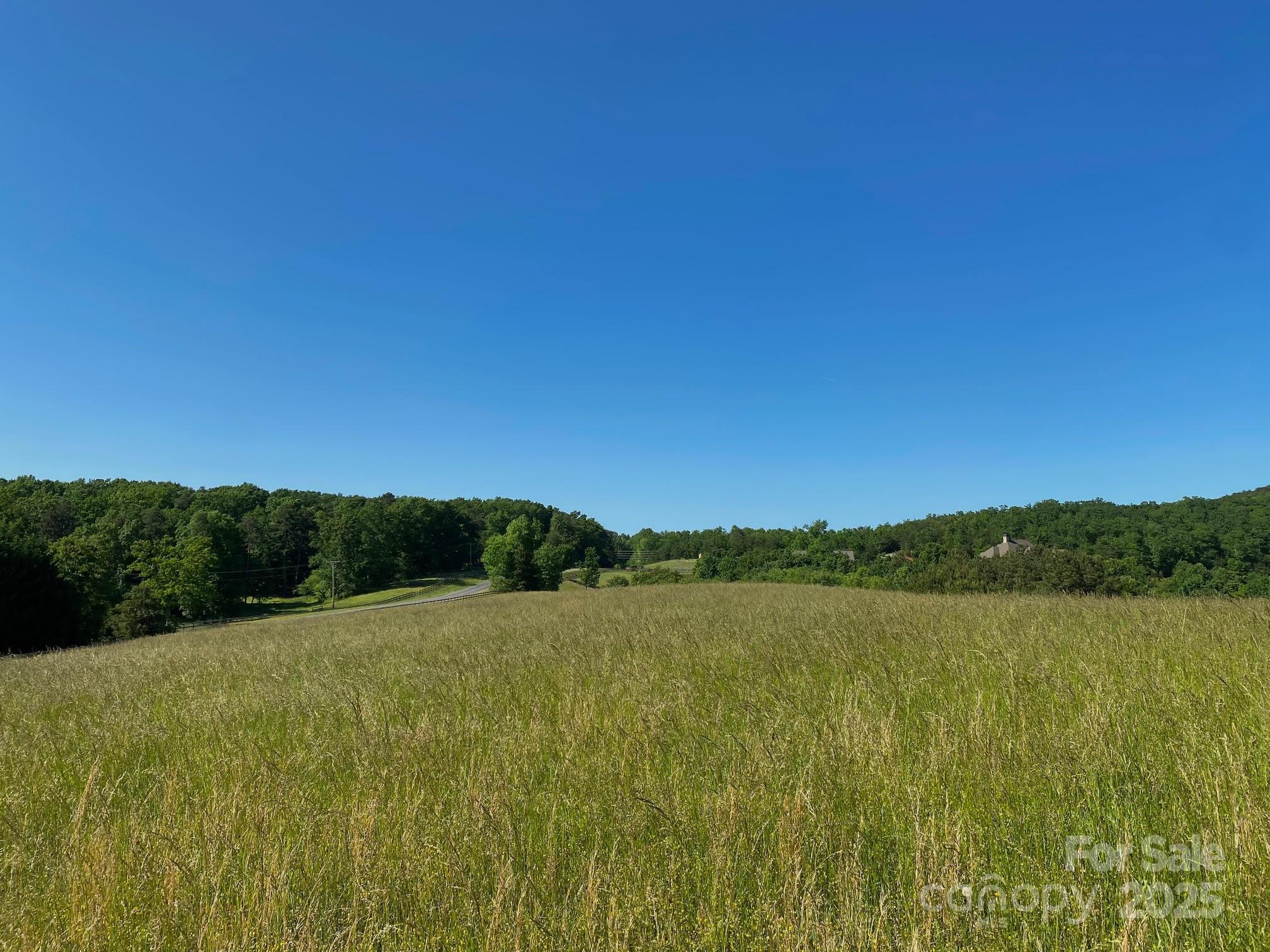 Mountain views with direct horse trail access! 17-acre parcel in picturesque country setting. Highlights include 10 +/- acres of cleared pasture areas, mountain views, and high-speed internet availability. Enjoy gentle breezes from several elevated potential building sites. Long range views to the east, mountains to the west. Ample space for home, small barn and fenced pasture. FETA trail runs down the northerly property line. Lower area on property provides room for riding arena. Tree buffer on 3 sides.  Great location. Convenient to area amenities and highway access. Ideal for small equestrian property or country home.