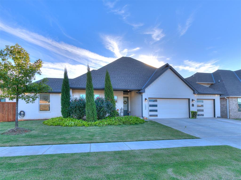 Discover an enchanting, better-than-new home of exceptional charm, further enhancing the esteemed Rockwell Parke community! This splendid home is finished with all the contemporary amenities, elegant touches, and cutting-edge designs that sophisticated buyers desire. The thoughtfully arranged kitchen is ideally suited for the culinary enthusiast in the household: a generous central island, gleaming stainless-steel appliances, surrounded by ample custom cabinetry and user-friendly elements that ensure seamless functionality. The living space features a stylish gas fireplace and transitions effortlessly through a highly livable open layout, fostering natural connection and flow. The true gem of this elegant property is the luxurious primary suite: a peaceful, spa-inspired retreat where the bathroom takes center stage, complete with a deep soaking tub, a modern tiled shower, and a spacious vanity topped with radiant quartz counters. A large walk-in closet offers abundant storage for your wardrobe. The additional bedrooms are equally roomy and inviting, providing comfortable havens. You'll fall in love with the private backyard, a lush sanctuary for relaxation! Enjoy a wealth of community perks, including a sparkling neighborhood pool. Don't let this opportunity for refined living at a reasonable price pass you by. The seller has elevated this residence with refined upgrades: enhanced insulation for optimal comfort, a secure in-ground storm shelter, a ceiling fan and TV mount on the rear patio for al fresco leisure, elegant blinds adorning the windows, and artfully stained backyard fencing for seclusion and charm. Welcome to your dream home!