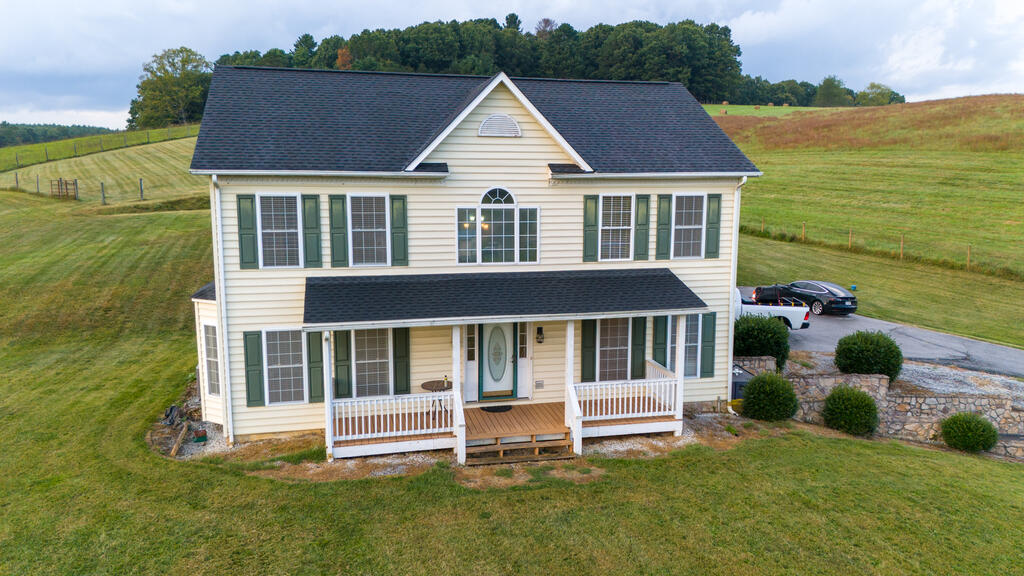 Breathtaking mountain views meet complete peace of mind at 4425 S Scenic Hwy! This beautifully maintained Bland County sanctuary features an upgraded kitchen, renovated bathrooms, and a cozy stack-stone fireplace as its centerpiece. Major updates are already complete with a brand-new 2024 roof and recently pumped septic system. Outdoor enthusiasts and craftsmen will love the dual detached structures, including a spacious 2-car garage and an expansive workshop ideal for projects or storage. Unwind on the porch and take in panoramic Blue Ridge scenery everyday. Clean, pristine, and ready to build your life in!