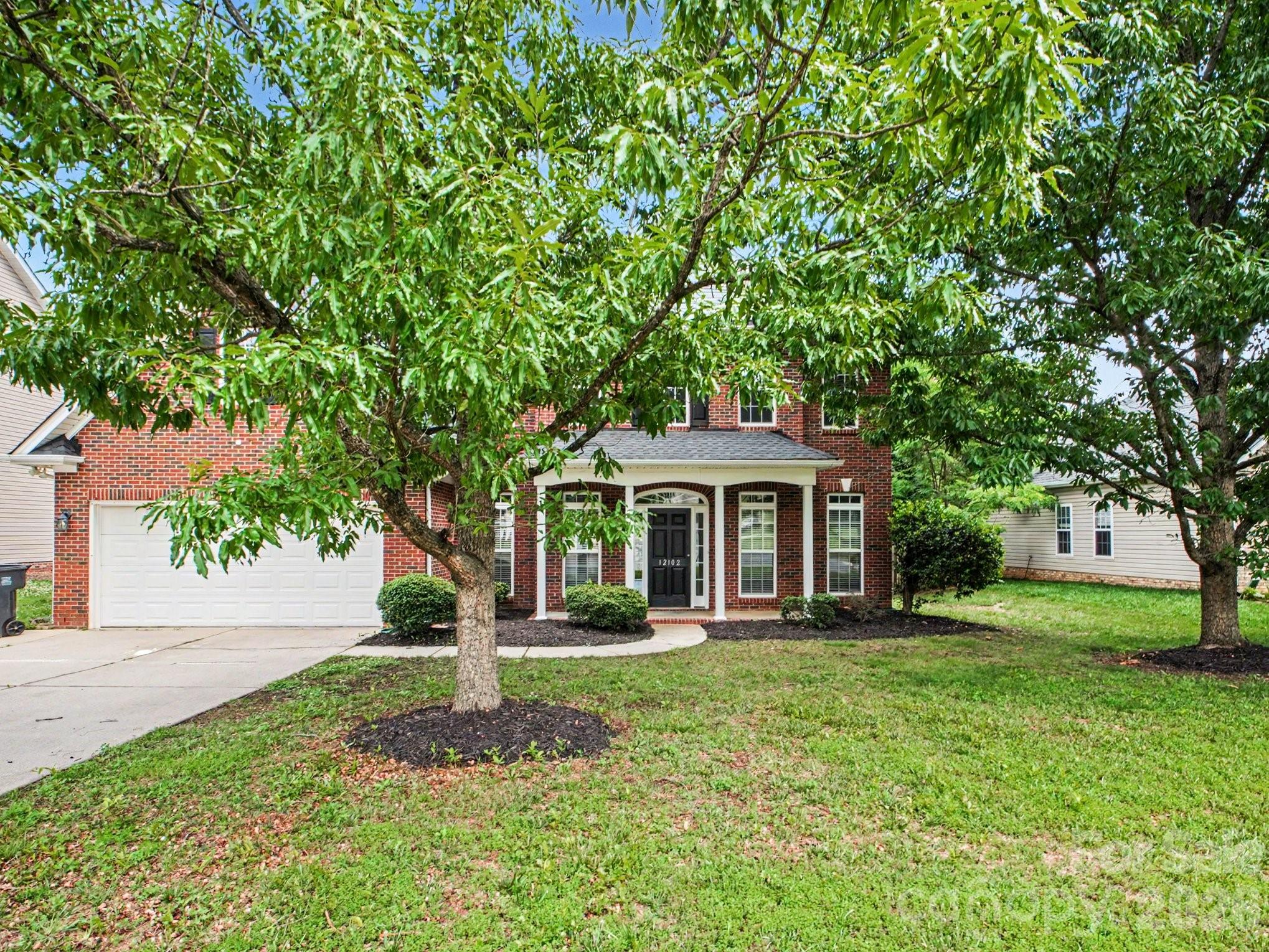 This 4-bedroom, 3-bathroom home offers a classic and functional layout, highlighted by a welcoming front porch and a traditional main floor featuring both a formal living room and a separate dining area. The heart of the home is an efficiently designed kitchen that provides a practical workspace for daily meals. Upstairs, the oversized primary suite serves as a true retreat, boasting a luxury bath and a generous walk-in closet. While the property needs some TLC, its substantial square footage and prime location near highways, shopping, and hospitals make it an incredible opportunity for a buyer looking to build equity in a highly convenient area.