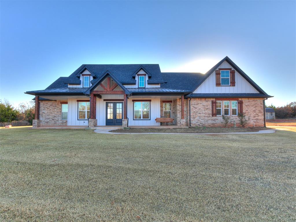 Spectacular 2 year old home on 10 acres in Norman. Open concept farmhouse design. Vast and roomy living room with vaulted wood beam ceiling, fireplace, wood floors and nice natural lighting. Kitchen is spacious with plenty of cabinets & quartz countertop space. Complete with farmhouse sink, stainless steel appliances (including a double oven), island with bar top seating, a large pantry and butler's pantry. The primary suite is delightful! Generous size bedroom with en-suite to full bathroom with free standing tub, separate shower, double vanities, private toilet, walk in closet, all perfectly connected to the laundry room for easy access. Secondary bedrooms are separated by the Jack & Jill bathroom, with double vanities and private toilet/tub area. Upstairs bonus room/flex space can be utilized in many ways. Lounging area, office space, play room, media room...use your imagination. It even has a full bathroom upstairs. You could even add a closet to convert it to a 4th bedroom. Garage is oversized for additional storage and holding the extra fridge &/or freezer. You will have peace of mind with the underground storm shelter, the Generac whole home generator and a security/ring system. Your appliances will last a lot longer with the whole house water softener/filter system. You can keep the property watered around the house with the multi-zone sprinkler system that runs off the well. Don't miss out on the opportunity to own and enjoy this wonderful home!
