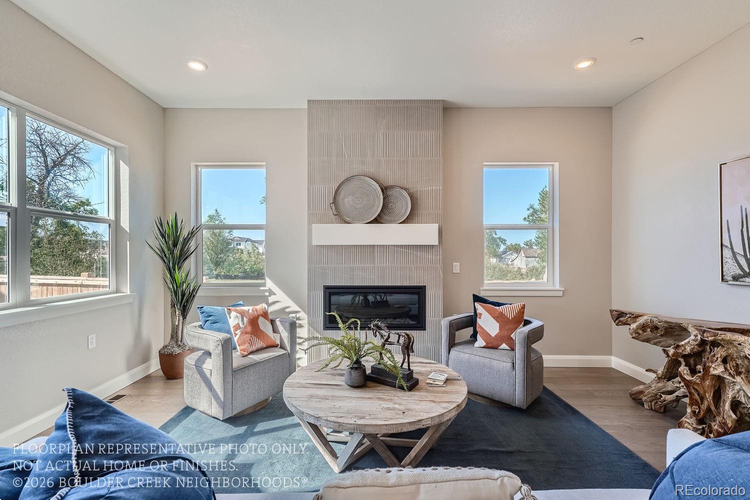 Introducing this stunning Alana floorplan built by Boulder Creek Neighborhoods! Located at our brand new neighborhood at Peacock Place in Boulder, this home features 3 Bedroom Suites including a Main Floor Bedroom Suite plus a 3 Car Garage with Finished ADU Space above. The Entertainers Kitchen with Thermador Appliances is just the start. With the 48” Cabinet Paneled Fridge/Freezer, a walk-in pantry, an extra prep sink, separate beverage fridge and a built -in ice maker, you’ll always have space for the holiday meal, and the two dishwashers will help make clean up a breeze! Also featured in this home, a private office space, front and back covered patios and upstairs loft. Need some extra space when family comes to visit? Above your 3-car, detached garage you will find a completely private, 1-Bedroom ADU apartment. With its own kitchen and full bathroom, this also works as a great rental if the space is not needed. Did we mention one of the bays in the 3-car garage has a 12’ door? Perfect for the conversion van or smaller RV/Trailer.  While there is a very limited number of homes in this unique neighborhood in South Boulder, there are 3 floor plans to pick from. These homes come with the ability to fully design the inside of your new home with $150,000 in design center upgrades that you choose! We can’t wait to show you more! Photos of Model Offsite. Move in December 2026