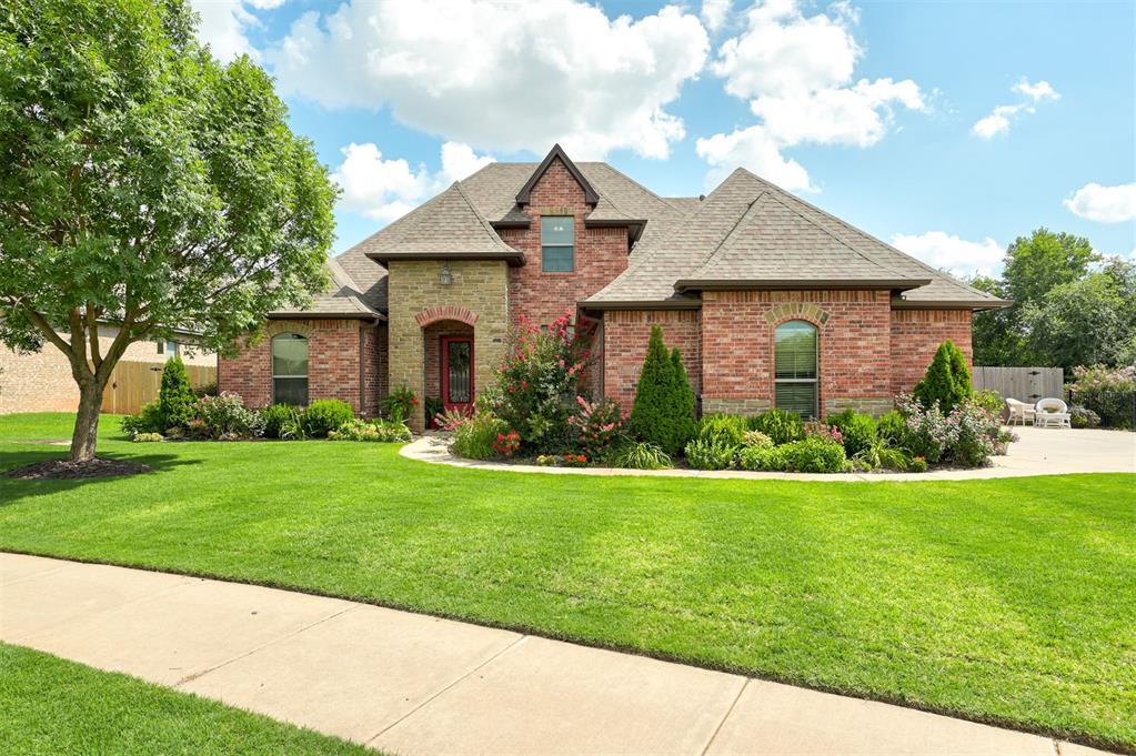 Welcome to this beautifully maintained home in a desirable gated community in Edmond! Situated on a gorgeous landscaped lot, this 4-bedroom, 3.5-bath home offers an exceptional floor plan with a private study, bonus room, and two dining areas. The spacious primary suite is located on the main level and features a luxurious en-suite bath. A second downstairs bedroom with a full bath provides the perfect setup for guests, a mother-in-law suite, or multi-generational living. Upstairs, you'll find additional bedrooms and a versatile bonus room, ideal for a game room, media room, or playroom. Thoughtfully designed for both everyday living and entertaining, this move-in-ready home offers comfort, flexibility, and timeless appeal. Beautiful landscaping, meticulous care, and a sought-after Edmond location make this home a must-see!