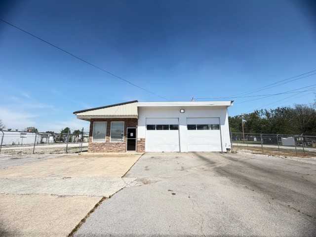 Prime Opportunity Alert!!  This versatile garage business sits on a large, fully fenced lot in a high-visibility location-perfect for turning your hustle into a thriving operation. Equipped with a car lift and commercial grade-air compressor, this property is ready for automotive work, small engine repair, or your next big business idea. With mixed-use potential, the possibilities are endless. Run your business, expand your portfolio, or create a space that works as hard as you do. Opportunities like this don't sit still!