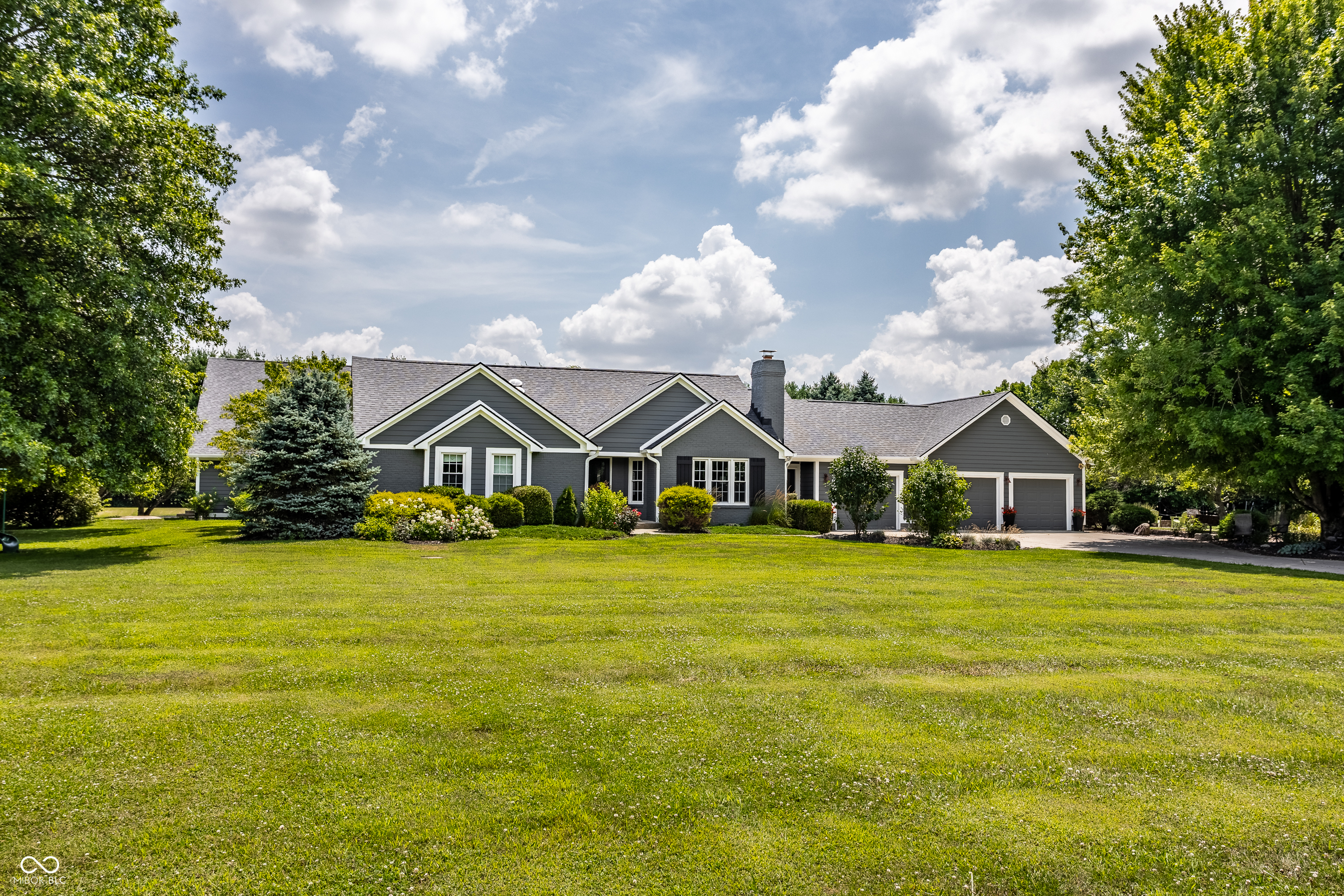 WOW! ONCE-IN-A-GENERATION OPPORTUNITY TO OWN THIS SPRAWLING RANCH ESTATE LOCATED ON A 7-ACRE UNBELIVEABLE PLAYGROUND. NO EXPENSE HAS BEEN SPARED IN THE RENOVATION & MAINTENANCE OF THIS PROPERTY. ENJOY 4-5 BEDRMS W/ DUAL MASTER SUITES. PROFESSIONAL KITCHEN GUT (2022) W/ THE HIGHEST LEVEL OF CABINETS, COUNTERS & FIXTURES, PANTRY, HEATED FLOORS & MOST IMPRESSIVE ISLAND. SEPARATE COFFEE BAR/SITTING ROOM, TOO! ENTRANCE TO HOME IS BRIGHT & AIRY W/ VAULTED LIVING RM W/ FIREPLACE & UNIQUE DINING RM. HUGE MUD ROOM W/ FRIEND'S ENTRY DOOR, CUBBIES & SMALL POCKET OFFICE SPACE W/ BUILT-INS. STUNNING 2-STORY GREAT ROOM W/ GLEAMING FLOORS & FRENCH EXTERIOR DOORS. DUAL MSTR SUITES W/ UPDATED SPA BATHS, WALK-IN-CLOSETS, MARBLE & MORE. FLEXIBLE INDOOR REC SPACE W/ INDOOR BASKETBALL COURT WHICH COULD BE CONVERED TO MORE BEDROOMS, CRAFT/PLAY ROOM, STUDY OR STUDIO. AND IN ADDITION TO ALL THIS, ENJOY ATTACHED IN-LAW QUARTERS/POOL HOUSE W/ KITCHEN, FULL BATH & WINDOWS/SUNLIGHT GALORE. ALL THIS ON THE MOST IMPRESSIVE EXTERIOR LOT WE'VE SEEN! PROPERTY BOASTS APPLE/PEACH/PEAR ORCHARD, SPRUCE TREES, FRISBEE GOLF COURSE, FENCED GARDEN, CHICKEN COOP W/ AUTOMATIC SOLAR COVER, IMPRESSIVE TREE HOUSE, 1000 SQ.FT POLE BARN GARAGE W/ 2 ADDITIONAL GARAGE BAYS & ELECTRIC. GAS FIREPIT, HUGE COVERED OUTSIDE PATIO W/ FIREPLACE, SURROUND SOUND, OUTDOOR TV & SEATING FOR YOUR BIGGEST EVENTS. PLUS, ENJOY 7-PERSON HOT TUB & 22,000 GALLON GUINITE SALTWATER SPORT POOL W/ HEATER & AUTOMATIC POOL COVER. AND, THE YARD IS HEAVEN-ON-EARTH FOR YOUR DOGS W/ FULL 7-ACRE INVISIBLE FENCE. NO ONE WILL BE SITTING INSIDE STARING AT THEIR IPADS OR CELL PHONES LIVING HERE! TANKLESS WATER HEATER, NEW ROOF/GUTTERS (2020), EXTERIOR PAINT (2023), INTERIOR PAINT (2025), FLOORING (2025), POOL COVER (2024) & SO MUCH MORE. THE LUCKY BUYER OF THIS HOME WILL ENJOY FUN LIKE NONE OTHER & CREATE LIFETIME UNIQUE MEMORIES. DON'T MISS!!  OPEN HOUSE, THURSDAY NOVEMBER 13TH, 4:00-6:00PM.