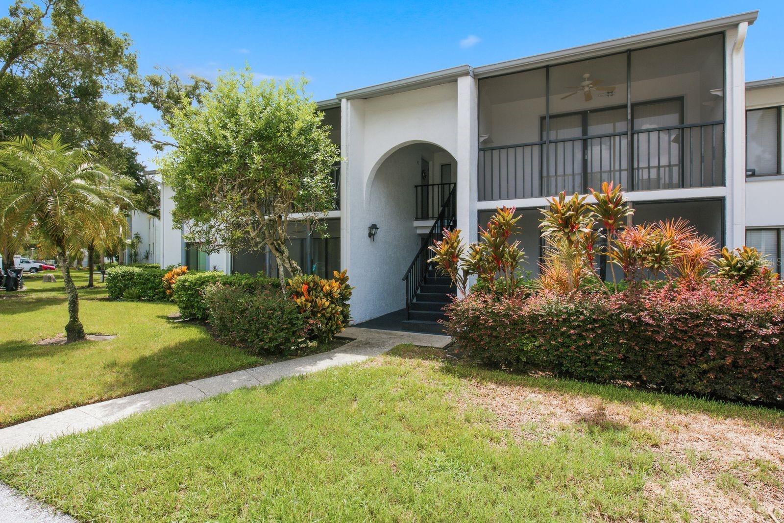 Craving a low-maintenance home with peaceful water views and room to truly settle in? This beautifully maintained two-bedroom, two-bathroom condo pairs 1,038 square feet of comfortable living with an appealing price point in sought-after East Lake.Fresh paint and luxury vinyl flooring create a crisp, move-in-ready backdrop throughout. The large living room offers ample space to unwind, while a separate dining room makes hosting feel effortless. In the spacious kitchen, generous cabinet and counter space keep meal prep organized, and the eat-in area is ready for coffee, breakfast, or that takeout dinner nobody needs to cook.The roomy primary bedroom includes a large walk-in closet and a private, updated bathroom. A generous second bedroom and refreshed guest bathroom provide flexibility for visitors, a home office, or hobbies. An interior laundry room adds everyday convenience—because hauling baskets across the community was never on the wish list.Outside, the pond-front setting gives the property an inviting, relaxed atmosphere, perfect for enjoying fresh air and a quieter pace. Community amenities include a swimming pool, tennis courts, and clubhouse, offering recreation close to home without adding weekend chores.The East Lake location places you near top-rated schools, and the shopping, dining, and recreation of Tarpon Springs and Palm Harbor. With thoughtful updates, attractive amenities, and strong value, this condo is ready for its next owner. Schedule your private showing and come see how easily life can fit here.