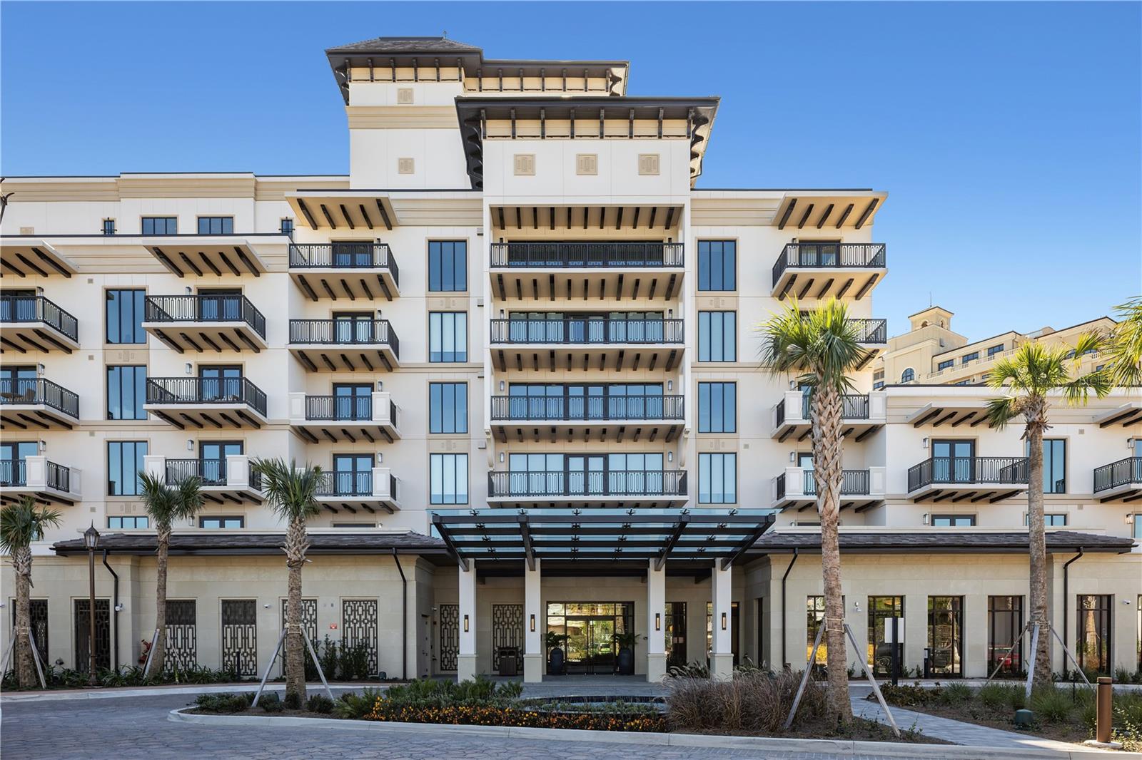 A new luxury Four Seasons Private Residences opportunity is now available at Golden Oak at Walt Disney World® Resort. The Florian Park project by HHR FSO LAND LLC will feature a collection of nine attached boutique homes and 31 luxe residences, including five stunning multi-level penthouses, all within a single, elevated residential address. Designed for hotel-inspired living at a magical address, these residences deliver a resort lifestyle enhanced by Four Seasons’ world renowned service. From the sun-filled gathering spaces and gourmet kitchen, to the generously proportioned primary bath, each Luxe Residence is filled with warmth and refinement. The Aria Luxe Residence features 3,477 square feet with 3 en-suite bedrooms and 2 flex spaces. Stunning living space with custom-built shelving featuring natural stone and warm, wooden accents. Gourmet kitchen with frameless contemporary cabinetry, a large center prep island, a spacious pantry with built-in cabinetry and refrigerated wine storage. Premium finishes including Wolf, Subzero, and Cove appliances enhance the gourmet kitchen, while other features include thoughtful balcony placement, and modern-transitional design. Golden Oak is a gated residential resort community where families can enjoy luxury, privacy, and the magic of Disney. It features distinctive neighborhoods with magnificent homes, expansive natural preserves, and a range of inviting amenities. Residents will have access to Golden Oak’s private clubhouse, Summerhouse, with superb dining, courtyards, a pool area, fitness facilities, and a family room. Additionally, residents can enjoy Club Life, which includes services like park transportation, signature club events, theme park experiences, and much more. As Four Seasons residents, owners will have access to exceptional services such as in-home dining, poolside food and beverage service, dog walking areas, and more. Exclusive privileges also include access to the Four Seasons Resort Orlando amenities, such as the Fitness Center, Tennis and Pickleball courts, the 13,000-square-foot spa, and the acclaimed Tom Fazio-designed Golf Course. Members also have the opportunity for unlimited golf and invitations to special events.