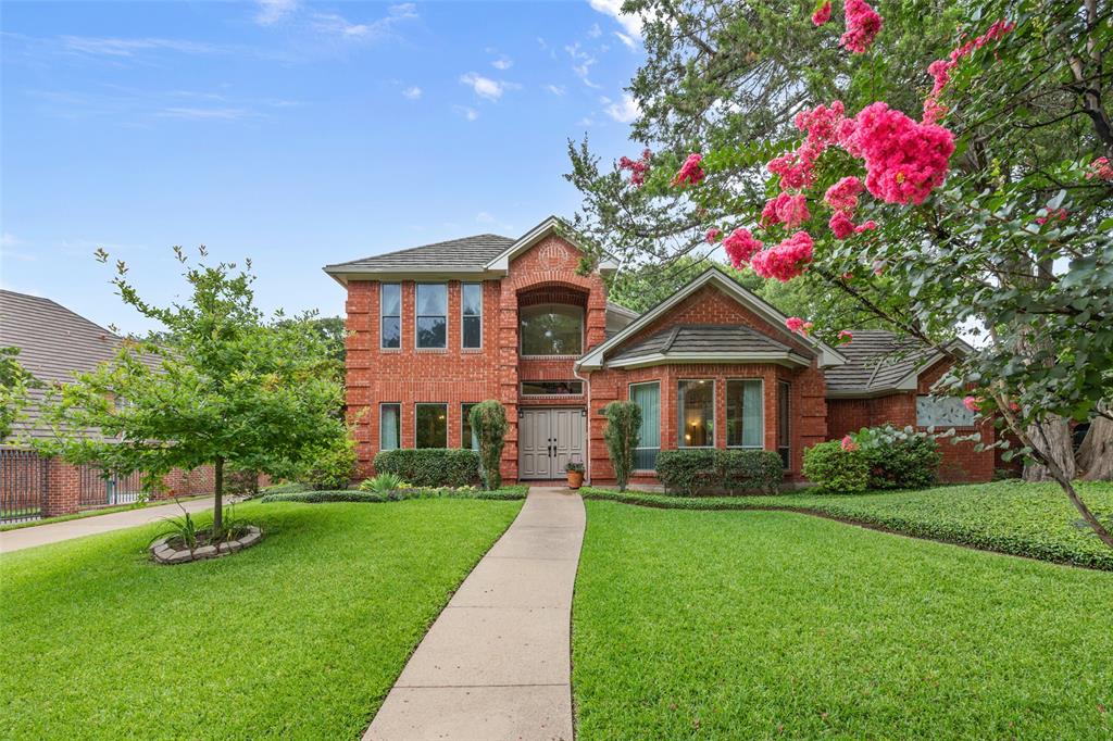 Tucked away in a quiet cul-de-sac in the exclusive Deerwood Park neighborhood, this beautiful two-story home sits on a picturesque lot with gorgeous mature trees. In serene setting with lush landscaping, and a sparkling pool surrounded by wooded privacy, this home offers a peaceful retreat with plenty of space to relax and entertain. Step inside to a grand entry with soaring ceilings that open to the formal living and dining areas. The updated kitchen features elegant quartzite countertops, double ovens, a built-in microwave, and flows seamlessly into the den and breakfast room. The breakfast area includes a built-in buffet, while the den centers around a charming fireplace and overlooks the stunning backyard oasis. The primary suite on the main level offers tranquil views of the pool and yard, and includes a spacious bath with dual sinks, bidet washlet a soaking tub, separate shower, and a walk-in closet. A second downstairs bedroom with a generous closet is conveniently located near a beautifully updated full bath. Upstairs, a large game room and two well-sized bedrooms, each with walk-in closets, are connected by an updated Jack-and-Jill bathroom featuring quartzite counters. Step out onto the upstairs balcony to enjoy peaceful views of the backyard. Special features include in-wall central vacuum, wired gigabit internet throughout, hot water recirculating system, very private, with woods behind lot, generous amount of storage cabinets, irrigation system, and removable pool fence. Upgrades include high end coated metal shingle roof, high capacity redundant drainage system, high efficiency windows upgraded in 2023 throughout, all three HVAC units and furnaces replaced and upgraded.