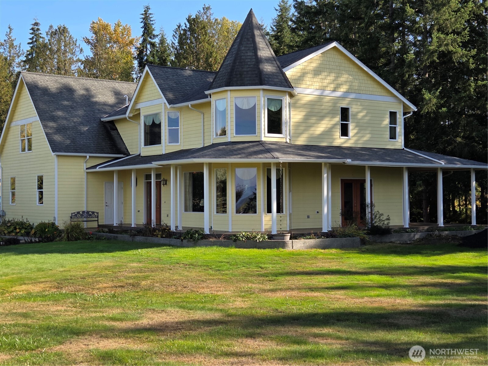 Beautiful home inside and out. Quality material used in the building of this custom home from solid wood trim and doors, granite counter tops, high end appliances, closets everywhere you turn, no shortcuts – incredible workmanship found throughout.  Spacious rooms including kitchen, sitting room upstairs accented with a gas fireplace and great views adds to the serene setting seen from most every room.  Enjoy the wildlife from the covered deck/patio area.  Fully equipped with gas hookups for your grilling pleasure regardless of the weather.  Install your own hot tub, the door from the kitchen in addition to the double doors from the primary suite to the covered patio help make mornings a bit easier to greet while you enjoy your coffee. The roughly 1000 sq ft family room featuring 4 closets, plumbed for a wet bar will leave you in awe with it’s size and layout.  Pool table and air hocky table are included if you desire.  Situated so noise does not easily radiate to other parts of the home. The primary suite features a walk in closet, room enough to make a king bed seem small, a bathroom with a jetted tub, shower, and double sinks. The outbuilding is used as an equipment shed on the South end and storage on the North. The North is set up as a potential ADU, 2 bdrm, 1 bath, potential for "extra" income.  The large open space to the South is home to wildlife for your enjoyment or cut paths in the field for Quad riding.