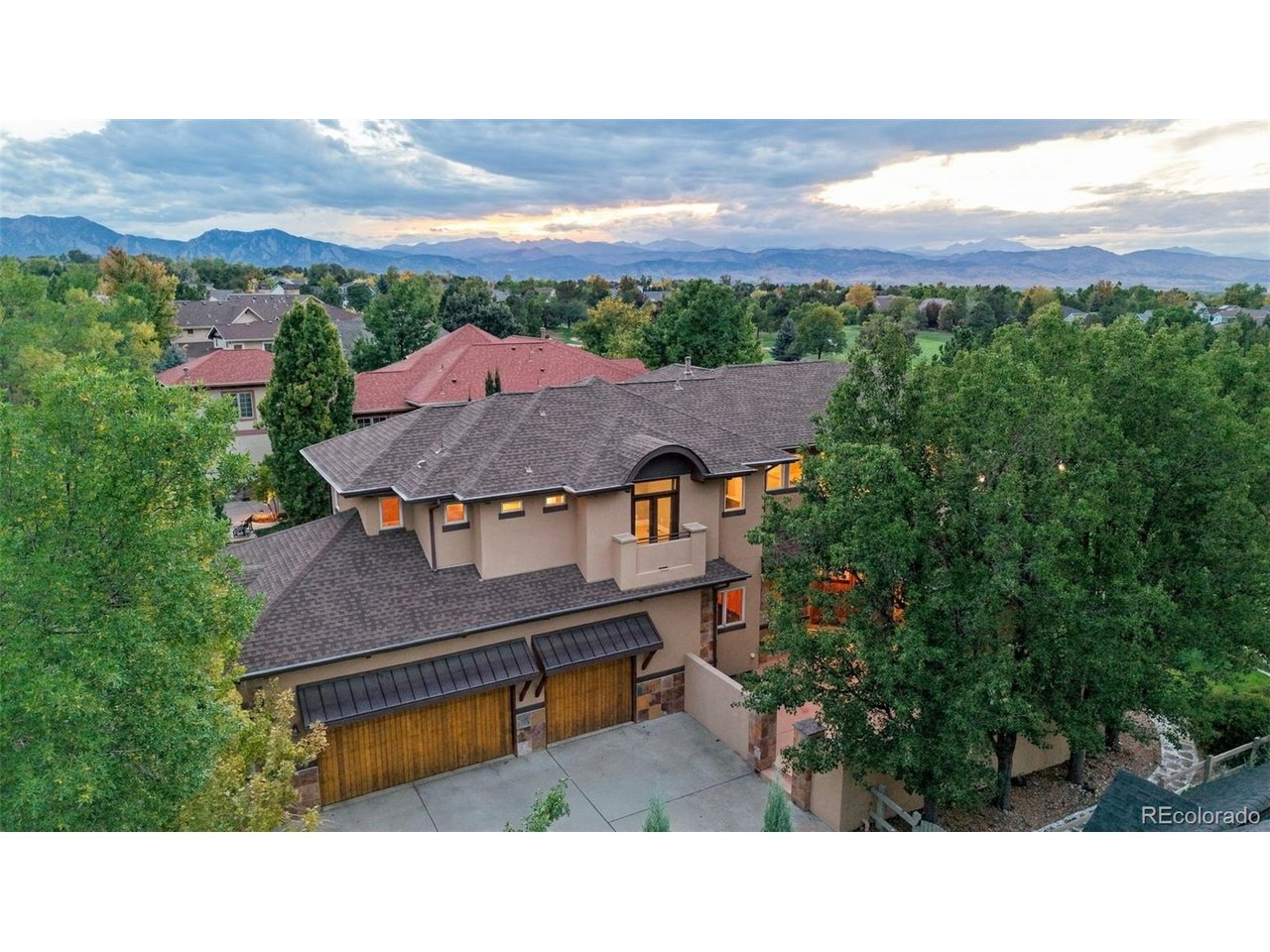 Welcome to 2854 Shoshone Trail, a beautiful semi-custom home set along the 4th hole of the Indian Peaks Golf Course in Lafayette. With golf course and mountain views, this 5-bedroom, 5.5-bathroom home offers a great mix of thoughtful design, comfortable living spaces and an incredible setting to call home. The main floor features an open floor plan with hardwood floors, high ceilings, large kitchen, formal dining room, living room w/fireplace, and private home office. Upstairs, you'll find four bedrooms, including a spacious primary suite with a five-piece bathroom, walk-in closet, fireplace and private deck with stunning views of the Front Range. The finished basement adds even more liveability with a fifth bedroom, large family room, space for a home gym and not one, but two storage rooms.If you are looking for that classic indoor/outdoor living that Colorado is famous for, this house has you covered. Out back there is a covered deck with great views of the Front Range and Longs Peak as well as a wonderful backyard featuring mature garden beds, lush grass and a beautiful water feature. As if that isn't enough, there is a private balcony off top floor w/fireplace and a a covered patio off the front of the house. As for location, it is tough to beat as Lafayette and the surrounding area feature great shopping and restaurants (check this out on a map, so much to do including Downtown Louisville which is just 1.8 miles away). If schools are important, don't worry, the home sits within the highly rated Boulder Valley School District. Lastly, if you need to commute to the office, Boulder is roughly 20 minutes away while Denver is just a bit further than that.Lastly and worth mentioning is the Seller has been meticulous with upgrades, maintenance and repairs since they purchased the home. New stucco, replacing the refrigerator, installing new carpet, replacing furnaces and water heaters and installing an EV charger. If the house needed it, they did it!