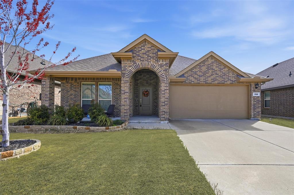 This beautiful 4-bedroom, 2-bath home offers 1,862 square feet with a functional open-concept layout ideal for everyday living.It showcases a large living room with a beautiful fireplace that opens to the kitchen and dining space perfect for gathering and entertaining. The kitchen features lots of cabinetry, tons of counter space, and is open enough to add a large island. Oh, did I mention the gas range which is perfect for the ice winters.The split master bedroom suite boasts privacy and includes an ensuite bath with an oversized shower, dual vanities along with a walk-in closet. Three secondary bedrooms offer flexibility for children, guests, or a home office.The backyard is well-sized for outdoor play, pets, and weekend gatherings without extensive maintenance.Conveniently located with quick access to I-30 and just minutes from Rockwall and Royse City shopping and dining. Built in 2021, offering modern construction and layout preferences buyers are seeking. Bring your pickiest buyers, this home is sure to wow them. Welcome Home.