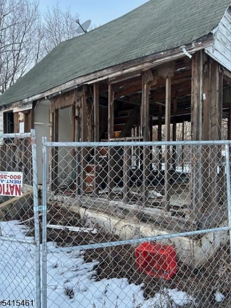 Opportunity awaits.  Sold as-is.  This property is suited for a complete teardown and redevelopment.  Situated on a desirable lot, this offers the perfect chance for builders, investors or buyers looking to build a dream home from the ground up.   The existent structure is not livable and requires removal.   With the right vision, this lot can be transformed into something special .  Bring your plans and imagination.