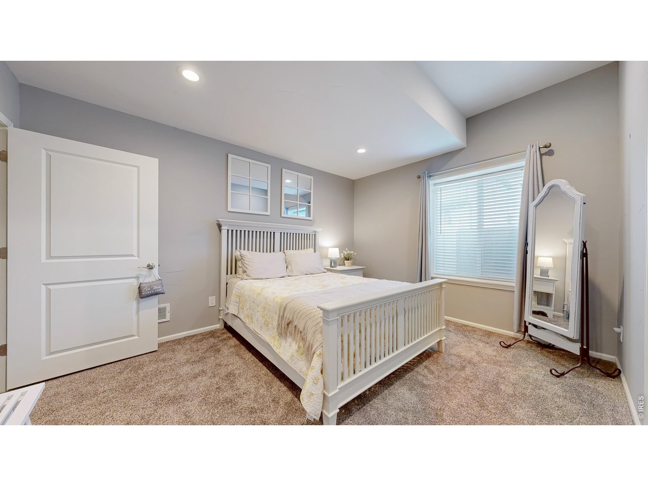 Pride of ownership and maintenance shows throughout this home! Nestled in The Lakes at Centerra neighborhood and situated on a corner lot, this ranch floor plan has so much to offer. Starting with a wide front entry so you and your guests feel welcome as soon as you walk through the door. The first floor features an office and a secondary bedroom with its own ensuite bathroom. The dining room feels luxurious with a built-in stone fireplace, perfect for sipping your coffee on chilly mornings or adding some ambience to your evening meals. The kitchen features a built-in oven/microwave combo and an oven/range with stainless-steel hood; perfect for the home chef. A butler's pantry tucked out of the way offers plenty of storage space for all of your kitchen essentials. The living room is bright and open and centers on a second gas fireplace. Finally, the primary suite is tucked out of the way in the back of the house. Featuring a large 3/4 bathroom with a dual vanity and recently updated, oversized shower, you'll feel like you're at your own personal spa. The finished basement is the perfect entertainment area, whether it's just you or all of your closet friends, this is the space you'll love to hang out in. This wet bar puts all other wet bars to shame, with a full-sized refrigerator and dishwasher; it's practically an extra kitchen. You have lots of counter space for serving your favorite beverages and game day snack. The little corner nook is the perfect space for the game table. An additional bedroom and bathroom round out the finished space. With another 700 sqft of unfinished space, you have options to expand or plenty of space for storage. Brand new water heater was just installed, peace of mind for the new homeowner!