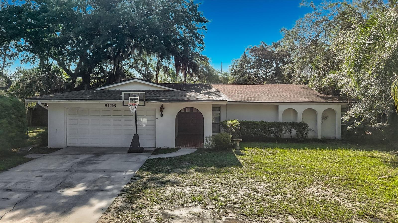 NO HOA. NO CDD. NO FLOOD ZONE.  COMPLETE RENOVATION OF THIS 4 BED 2 BATH POOL HOME ON A 1/3 ACRE.  Entering the Double Door Entry, a full view of the Pool and fenced over-sized back yard.  Light and Bright with lots of natural lights.  Porcelain floors throughout, with Laminate in Bedrooms.  Wood Kitchen Cabinets with lots of counter space.  Stainless Appliances.  Dual Sinks with extra long counter overlooking the outside. Both Bathrooms have been completely renovated with step-in showers and spacious areas.  Pavers in both the front entry way and screened in pool lanai. Roof 2021. Home is close to all USF, shopping and entertainment. Approximately 20 minutes from downtown Riverwalk.  Seller is motivated.  Make your appointment today!.  More pictures coming including the pool.