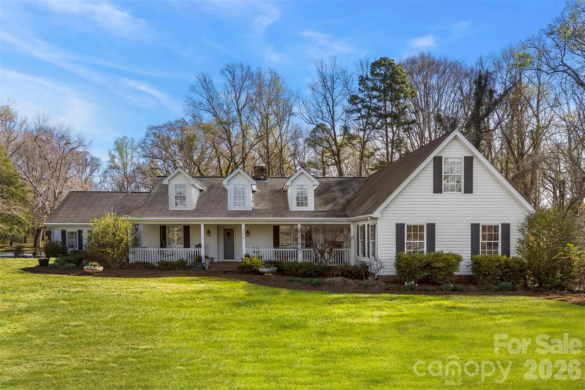 Space, Charm & Country Living—Just Minutes from Everything!Enjoy the best of both worlds with this nearly 4,000 sq. ft. four-bedroom, three full bath home perfectly situated on 4.35 beautiful acres and room to breathe—complete with an older but very usable 3 stall pole barn.Inside, you’ll find gorgeous hardwood floors throughout the main level and an abundance of spacious rooms designed for both entertaining and everyday comfort. Gather in the huge family room, enjoy meals in the spacious breakfast area, host holidays in the formal dining room, relax in the formal living room, or work from home in the light-filled office/study. This home is perfect for entertaining!Love hanging outdoors? This home features covered porches on both the front and rear, including a covered back porch perfect for relaxing and taking in the peaceful surroundings and privacy.The primary suite on the main level offers a tiled bathroom with separate shower and whirlpool tub, while the second main-level bath has been beautifully updated with tile and a gorgeous refinished claw-foot tub. Upstairs, the third full bath features tiled floors, a tiled shower, and an upgraded vanity, along with the 4th bedroom and an additional room with a closet also. A secondary stairway leads to yet another living space which is two more rooms with bookshelves, perfect for playroom or flex room. With multiple gathering spaces, incredible character, and room to spread out, this property offers the charm of country living with the convenience of being close to everything.So much space. So much character. So much to love.