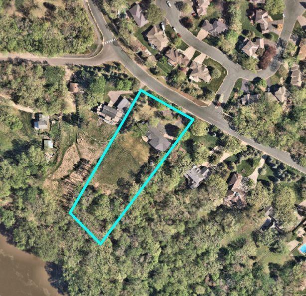 Perched atop the majestic river bluffs and spanning a generous 2 acres, this remarkable property offers panoramic views of the Minnesota River Valley and the protected Wildlife Preserve. Located in a peaceful and private setting, the lot provides the perfect canvas for your vision—whether you're looking to build or possibly remodel this single-level rambler. With mature trees and endless views, the natural landscape offers both inspiration and serenity. Enjoy the flexibility of choosing your own builder and design, with no restrictive covenants holding you back. The lot is open to all builders, making it an ideal opportunity for homeowners or developers seeking a premier location with unmatched surroundings. This rare gem offers daily sunrise and sunset views & endless wildlife.