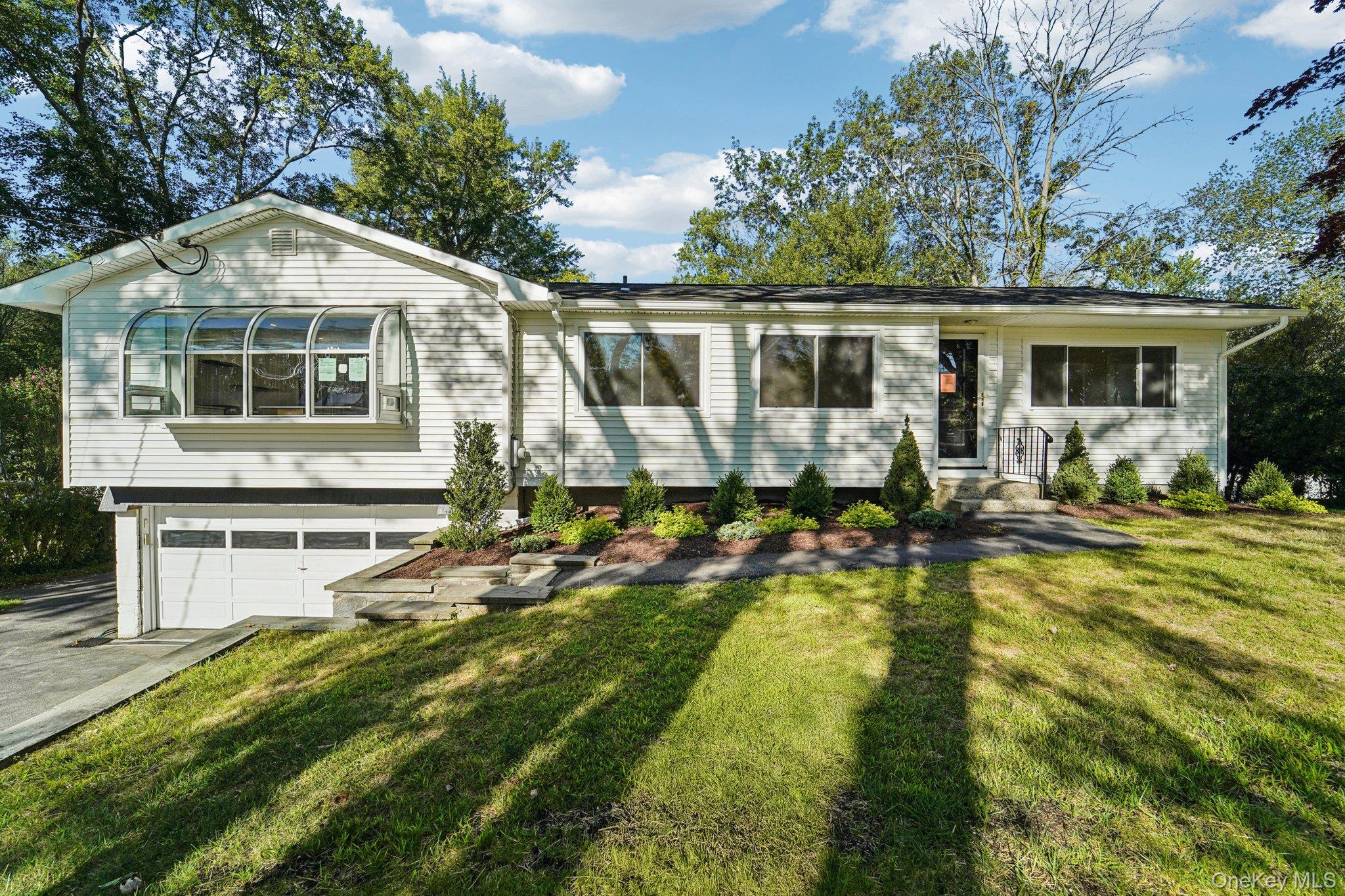A rare opportunity awaits in the heart of Yorktown.

This beautiful ranch home was briefly taken off the market to complete the final, meticulous touches—and now it's perfectly move-in ready. Forget the hassle of endless to-do lists; this is a home where you can truly unpack and start living from day one.

Step inside and prepare to be genuinely impressed. The fully renovated interior is a sophisticated showstopper, meticulously designed to exceed every expectation. The kitchen is a true culinary centerpiece, featuring elegant quartz countertops and an expansive, 8-foot island that comfortably seats six. All-new stainless steel appliances, including a convenient beverage fridge, complete this perfect gathering space.

The thoughtful design continues throughout, with unexpectedly large bedrooms. The primary suite offers the privacy and tranquility you deserve, complete with its own dedicated sitting room. Head downstairs to find an oversized laundry room and a bright, inviting family room, complete with sliders that open to a private, level rear yard.

But the rebirth of this home extends far beyond the interior. It has been transformed from the outside in with new siding, new gutters, and new windows, ensuring both undeniable curb appeal and absolute peace of mind. The two-car garage provides ample space, plus extra room for your small boat or motorcycle.

With its move-in ready status and an air of undeniable sophistication, this isn't just a house—it's the fresh start you've been waiting for.

(For those who qualify, the basic STAR rebate is $1,678.76.)