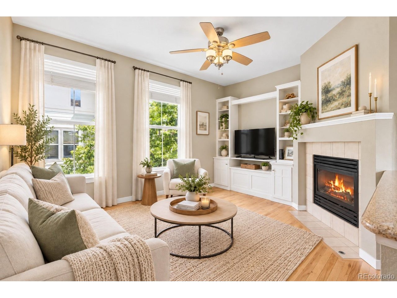 INCREDIBLE VALUE!! Charming, west-facing, and beautifully maintained, this Coal Creek Village townhome offers the perfect blend of natural light, thoughtful updates, and low-maintenance living in one of Lafayette's most desirable locations. With windows on multiple sides, the home feels bright, warm, and inviting from the moment you step inside. The open-concept main level features natural hardwood floors and a spacious layout that is ideal for both everyday living and entertaining.Step outside onto the expansive deck and enjoy your morning coffee, unwind after a long day, or dine al fresco. This outdoor living space truly functions as an extension of the home, creating additional room to relax and entertain. Upstairs, you'll find two generously sized bedrooms and a full bathroom, while the main level offers a convenient powder bath for guests. The attached two-car garage provides ample storage and everyday convenience. Built with efficiency and comfort in mind, this green-built home boasts an excellent HERS rating, is pre-plumbed for radon mitigation, and was designed with strong sound separation for added privacy and peace of mind. The professionally managed community features parks and a playground, while the HOA covers exterior and structural maintenance, grounds maintenance, road maintenance, and snow removal.Recent updates provide true move-in-ready peace of mind, including a new deck (2020), refrigerator (2020), washer/dryer (2021), stove (2022), furnace and air conditioner (2025), over-the-range microwave (2026), professionally cleaned windows (2026), and new smoke detectors (2026).And the location simply can't be beat! Enjoy easy access to trails, breweries, shopping, restaurants, and the vibrant downtown Lafayette. Spend weekends exploring local boutiques, dining at favorite neighborhood restaurants, visiting the Farmers Market, and enjoying the countless community events that make Lafayette such a special place to call home.