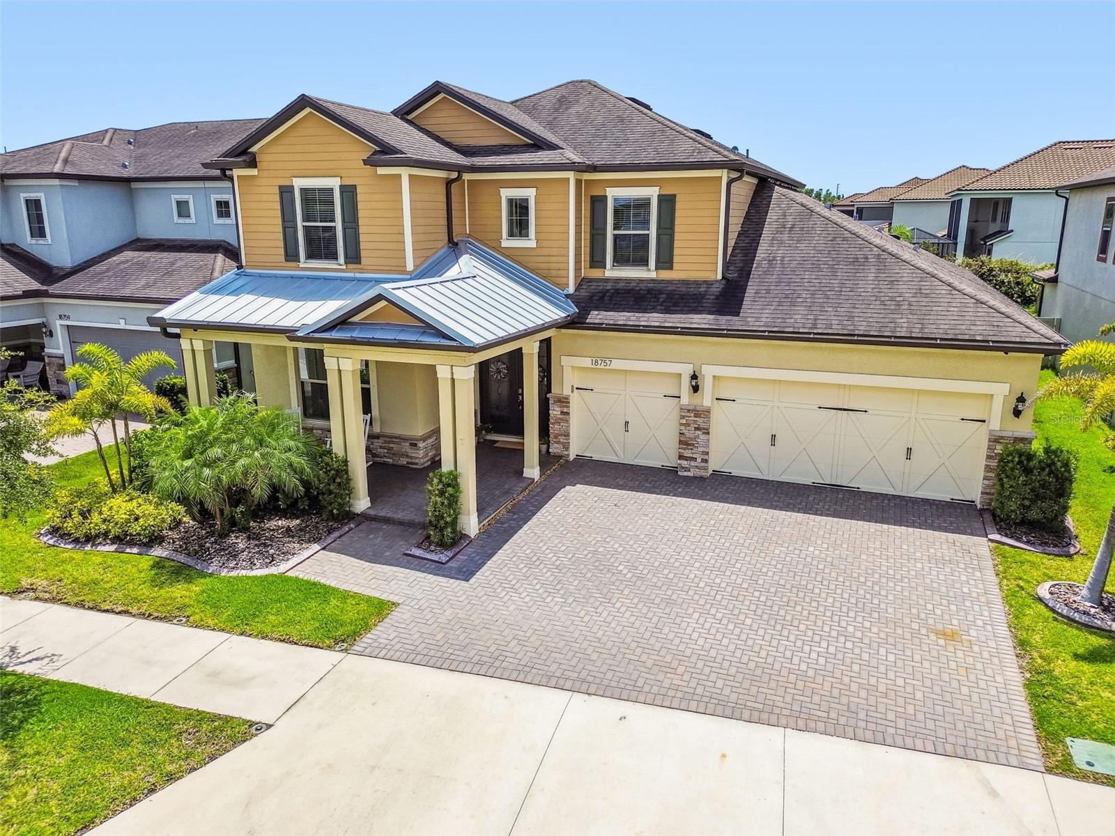 Absolutely stunning move-in ready home is located in a gated community with Grade A schools and a resort style community pool and playground.  As you arrive to this lush neighborhood of Birchwood Preserve you will notice the attention to detail as you pull up to this
gorgeous home that offers impeccable curb appeal including beautiful paver driveway, landscaped curbing and serene porch. This executive home features 4 bedrooms and 3.5 bathrooms, with a total of 3,439 square feet of living space.   If you like to entertain,  you are going to love the amazing extended kitchen offering 42" staggered white cabinets that extend the entire wall of the eat-in cafe space, with crown molding, underpot storage drawers. custom backsplash, high end faucet and amazing pendant lights complete the family and the entertainment friendly space.  The whole back of the house opens up through triple sliders to the perfectly manicured backyard retreat including a paver covered patio space.  Also opening to the fully fenced in backyard is the LARGE master retreat, including luxurious bath with an oversized walk in shower with porcelain and a 2nd rain head shower head, double sinks, granite counter and huge walk in closet system.  Upstairs you will find a large bonus/loft area perfect for playing game, exercise space, or an  in home movie theater.  There are 3 additional bedrooms and 2 full bathrooms with additional two storage closets on this second floor.   This home offers a 3 car garage with additional storage space including cabinets and overhead storage for garage organization.  This home has too many upgrades to list.  This is a MUST SEE in person home.  Schedule your appointment today