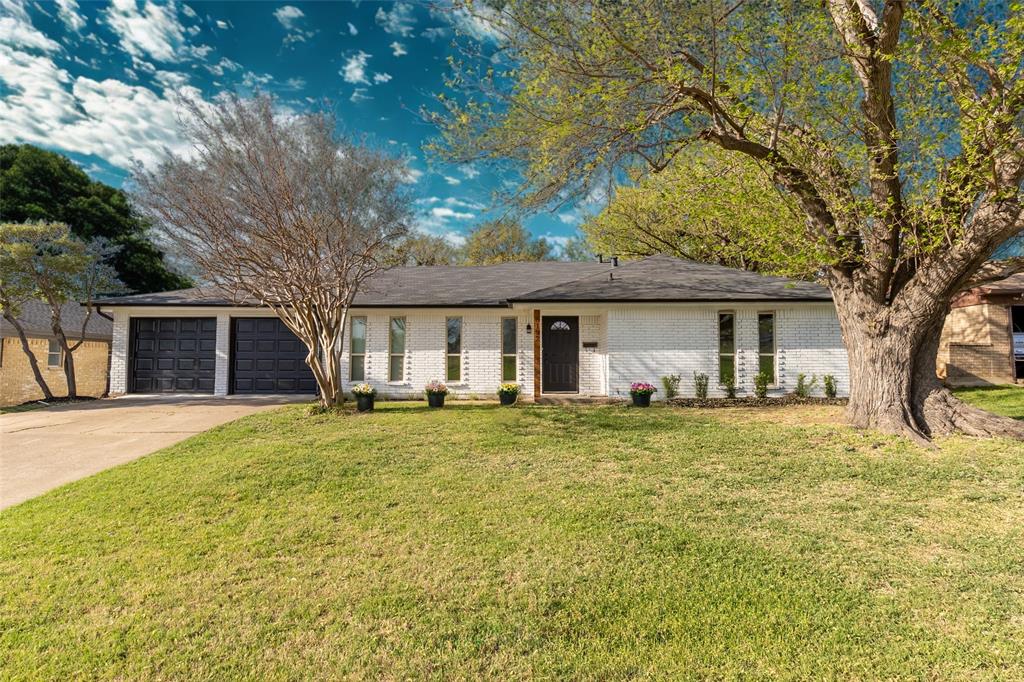 Charming Renovated Home in a Desirable Fort Worth Neighborhood!

Located just across from the elementary school, this beautifully updated 4-bedroom, 2-bathroom home with a 2-car garage is move-in ready! The striking black garage doors and crisp white brick exterior create stunning curb appeal.
Notable items to mention cast iron plumbing has been changed out, New electrical panel, New added AC in sunroom, New hot water heater, New windows and New roof!

Step inside to a spacious living room featuring a gorgeous brick fireplace—perfect for cozy evenings. The kitchen is a showstopper with honed black granite countertops that offer a sleek, matte finish, complemented by a modern white backsplash and freshly painted white cabinets. Brand-new appliances complete this stylish space.

A bright and versatile sunroom overlooks the expansive backyard, which boasts mature magnolia trees and a large workshop that stays with the home.

Stylish updates throughout include light ash-colored luxury vinyl plank flooring in the main living areas and kitchen, plush new carpet in the bedrooms, and freshly painted walls for a clean, modern feel. The master bathroom features a frameless glass shower and contemporary tile, paired with black honed granite for a sophisticated touch.

The split-bedroom layout includes a front bedroom, plus two additional bedrooms sharing a dual-sink bathroom with a separate toilet and shower area—perfect for convenience and privacy.

Don’t miss out on this must-see home!